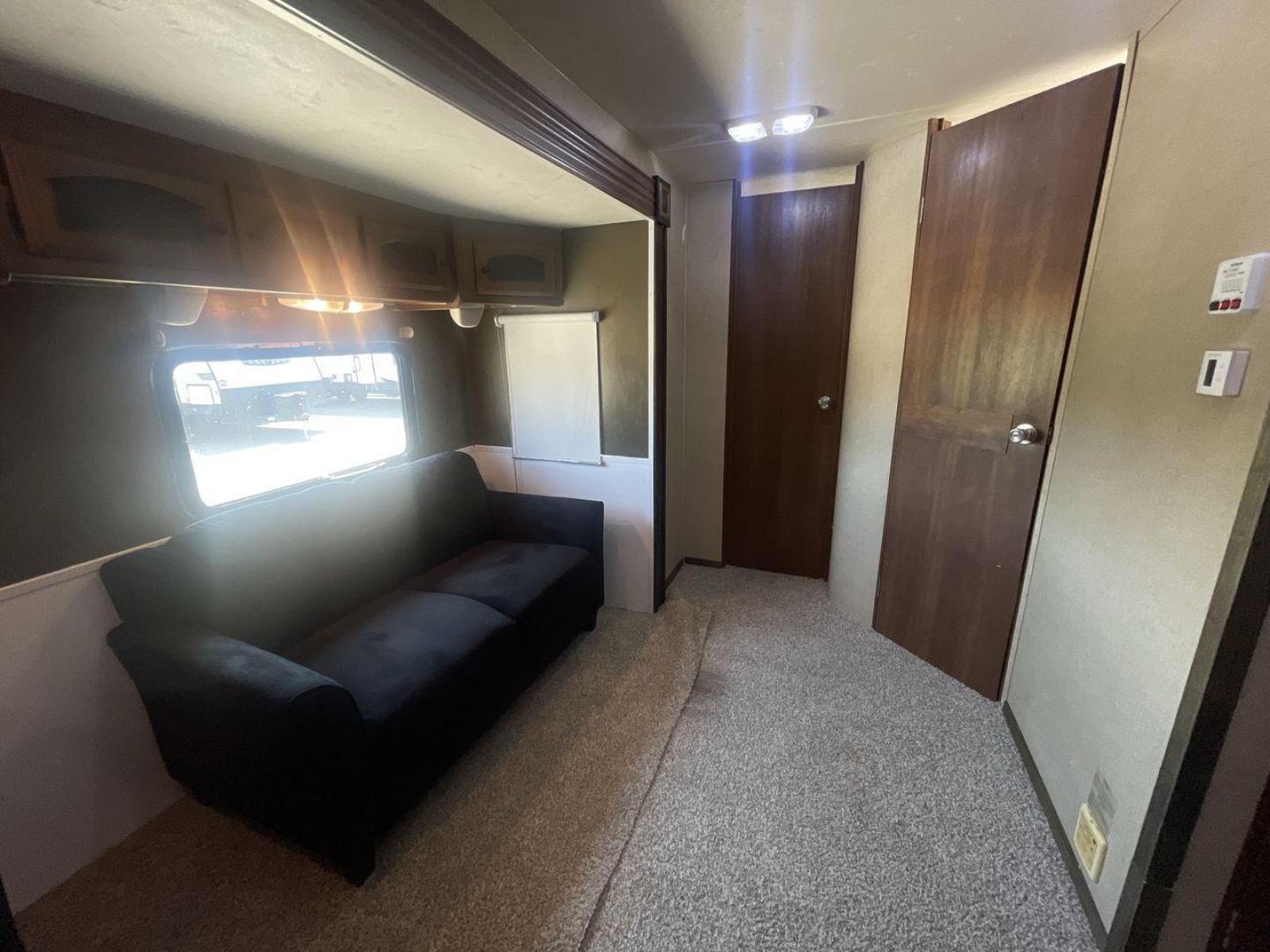 2015 TAN COACHMEN FREEDOM EXPRESS 320D (5ZT2FEXB6FA) , Length: 36.92 ft | Dry Weight: 7,374 lbs | Gross Weight: 10,700 lbs | Slides: 3 transmission, located at 4319 N Main St, Cleburne, TX, 76033, (817) 678-5133, 32.385960, -97.391212 - Photo#10