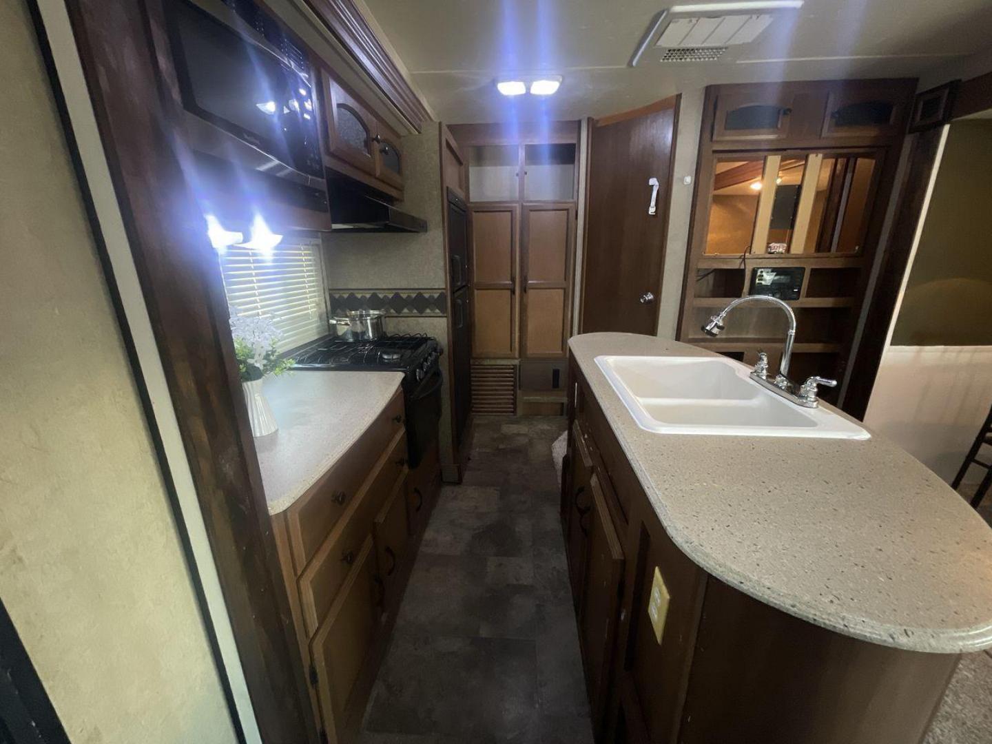 2015 TAN COACHMEN FREEDOM EXPRESS 320D (5ZT2FEXB6FA) , Length: 36.92 ft | Dry Weight: 7,374 lbs | Gross Weight: 10,700 lbs | Slides: 3 transmission, located at 4319 N Main St, Cleburne, TX, 76033, (817) 678-5133, 32.385960, -97.391212 - Photo#12