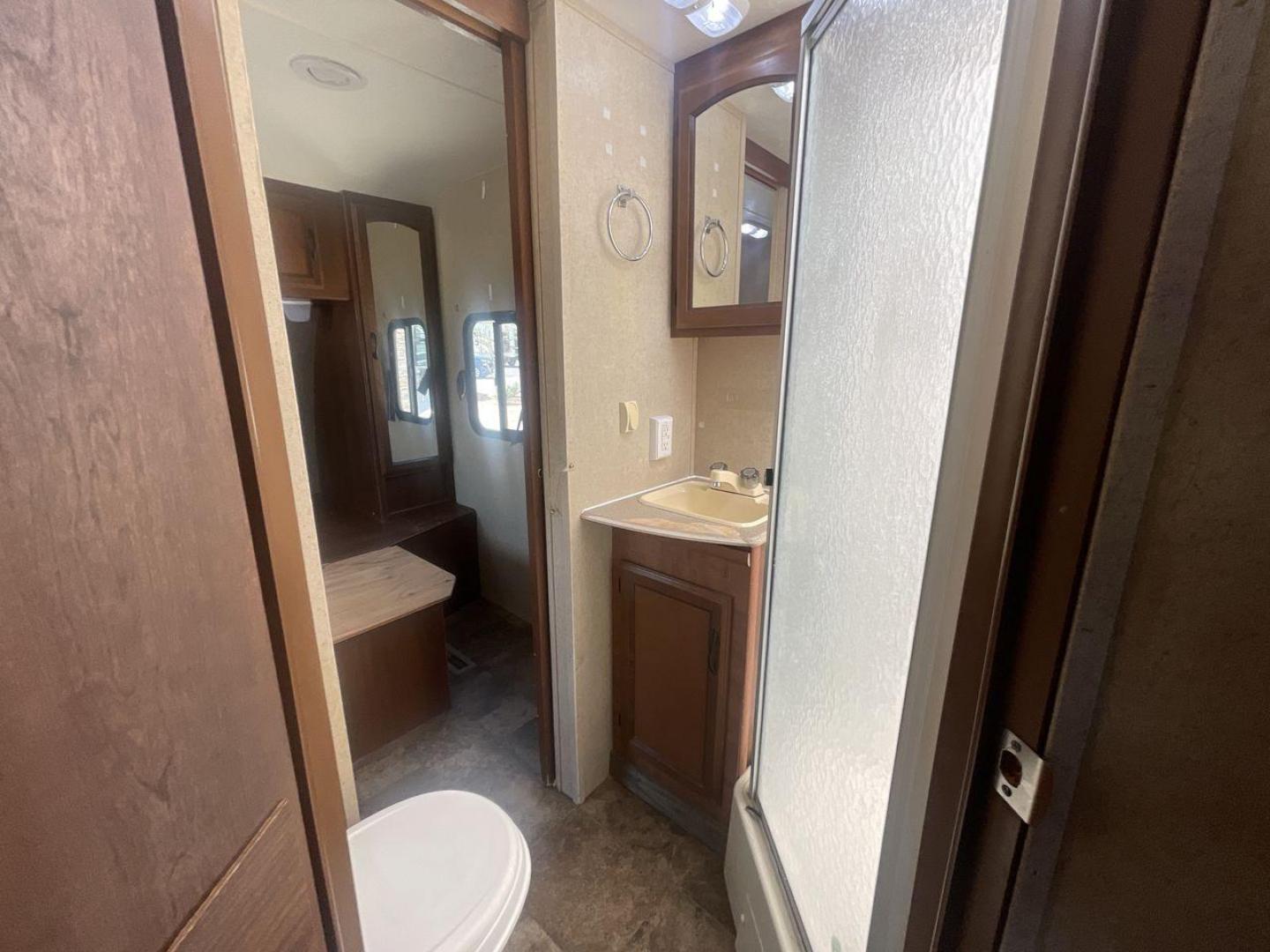 2015 TAN COACHMEN FREEDOM EXPRESS 320D (5ZT2FEXB6FA) , Length: 36.92 ft | Dry Weight: 7,374 lbs | Gross Weight: 10,700 lbs | Slides: 3 transmission, located at 4319 N Main St, Cleburne, TX, 76033, (817) 678-5133, 32.385960, -97.391212 - Photo#14