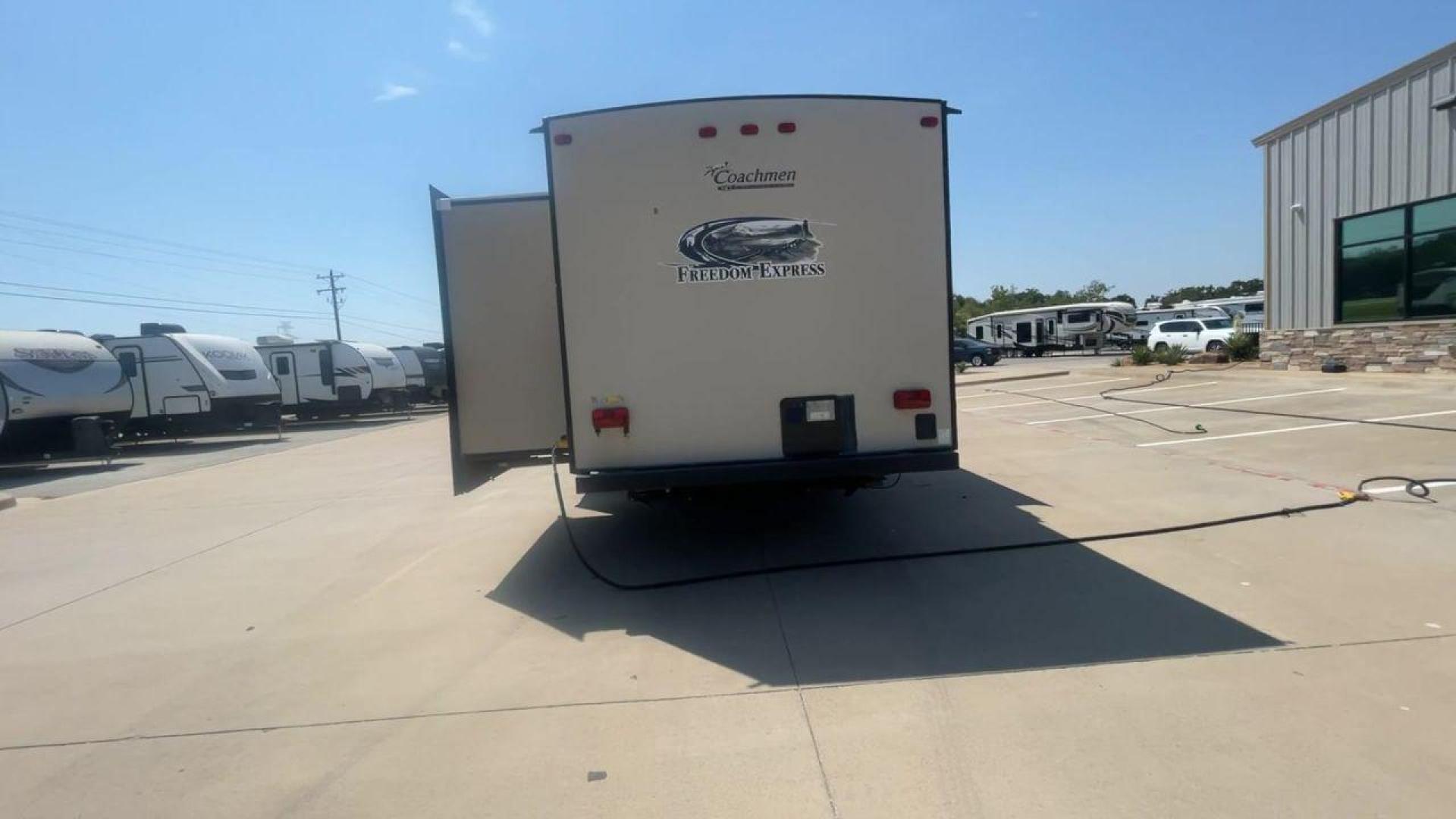 2015 TAN COACHMEN FREEDOM EXPRESS 320D (5ZT2FEXB6FA) , Length: 36.92 ft | Dry Weight: 7,374 lbs | Gross Weight: 10,700 lbs | Slides: 3 transmission, located at 4319 N Main St, Cleburne, TX, 76033, (817) 678-5133, 32.385960, -97.391212 - Photo#8