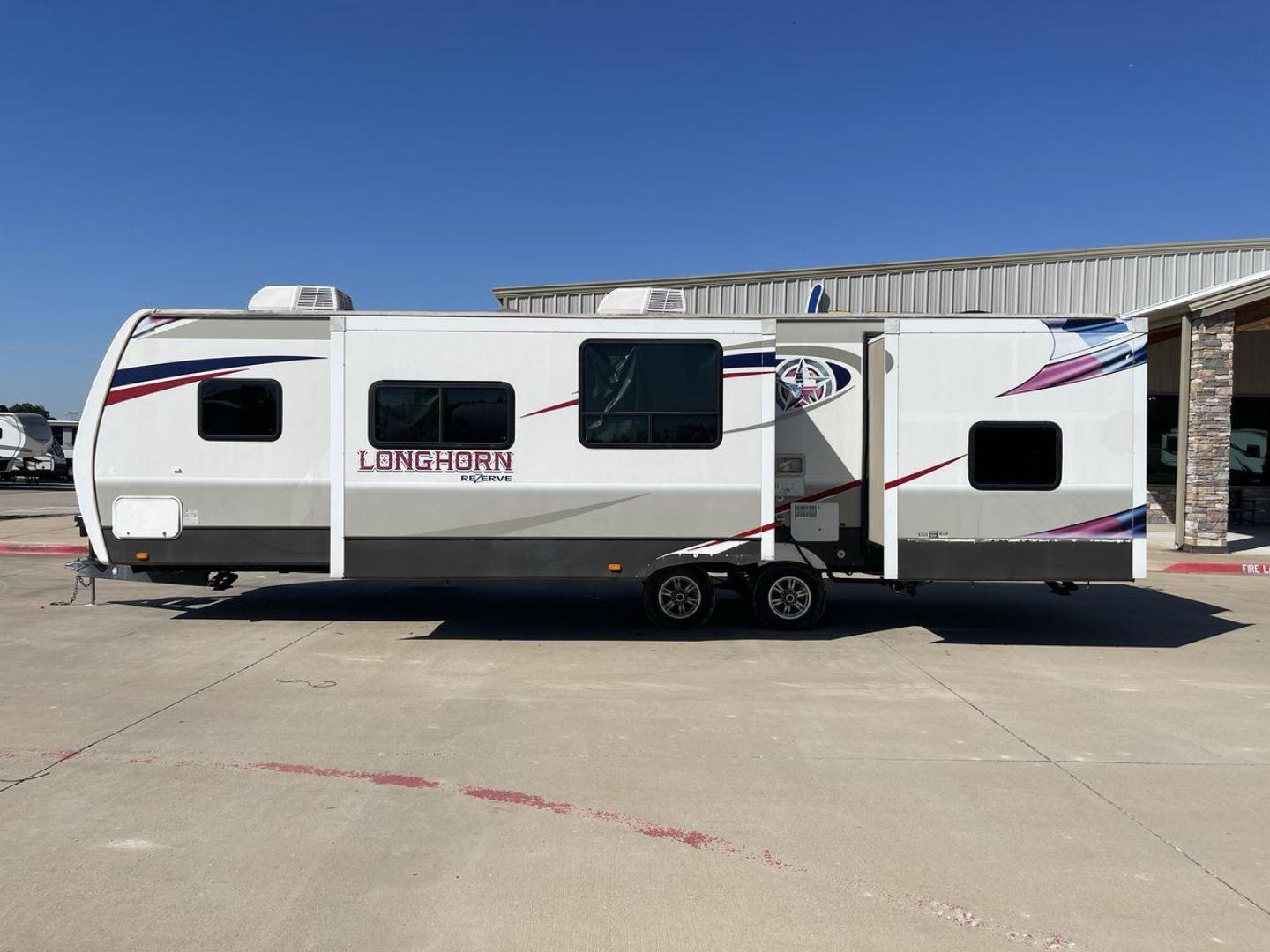 2015 CROSSROADS LONGHORN 31SB (4V0TC3124FE) , Length: 35.5 ft. | Dry Weight: 7,875 lbs. | Gross Weight: 9,671 lbs. | Slides: 2 transmission, located at 4319 N Main St, Cleburne, TX, 76033, (817) 678-5133, 32.385960, -97.391212 - The 2015 Crossroads Longhorn 31SB is a well-crafted travel trailer with thoughtful design features and ample space, making it a great choice for families or groups looking for comfort on the road. The exterior of the Crossroads Longhorn 31SB is sleek and modern with a white body and tasteful accents - Photo#21