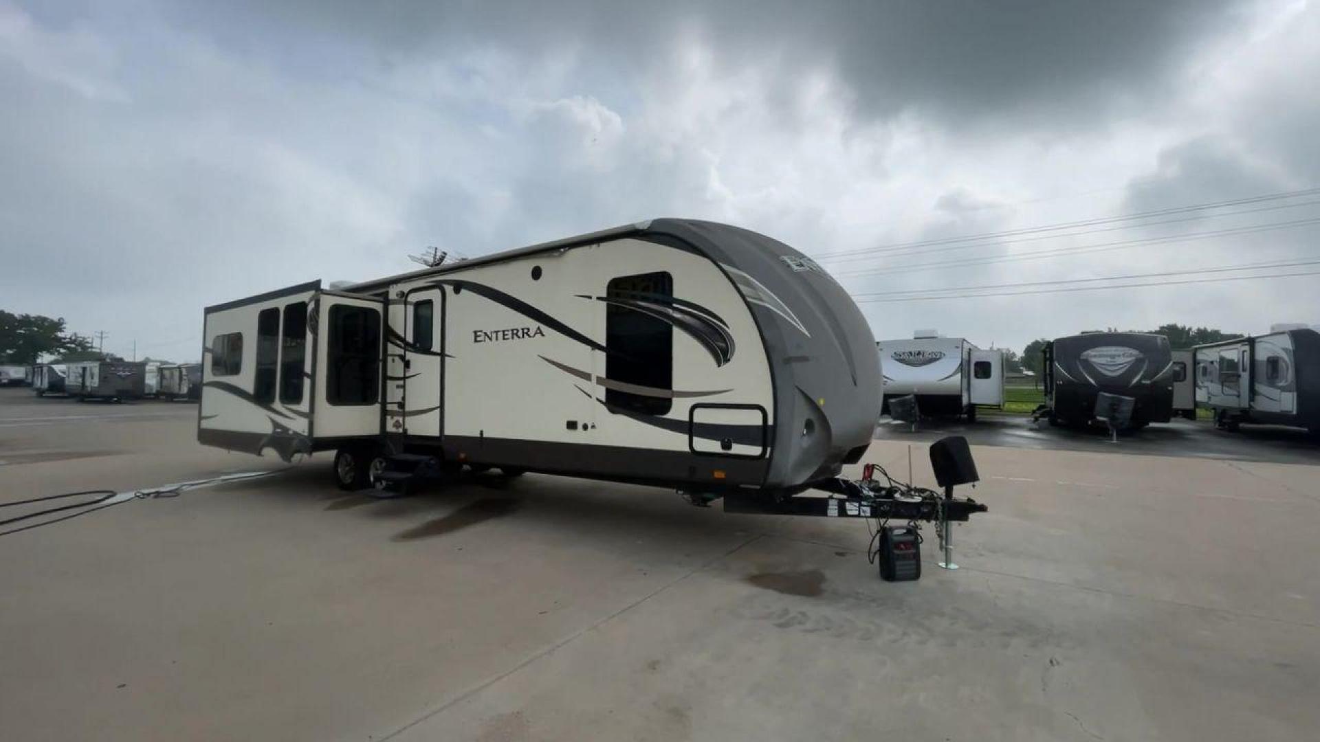 2015 CRUISER ENTERRA 315RLS (5RXTE3126F2) , located at 4319 N Main St, Cleburne, TX, 76033, (817) 678-5133, 32.385960, -97.391212 - The 2015 Cruiser Enterra 315RLS Travel Trailer offers elegance and comfort on the road! This gorgeous trailer provides the ideal balance of design, usefulness, and convenience for your next excursion. The Enterra, which measures 36.75 feet long and weighs 8,030 pounds dry, is both large and lightwei - Photo#3