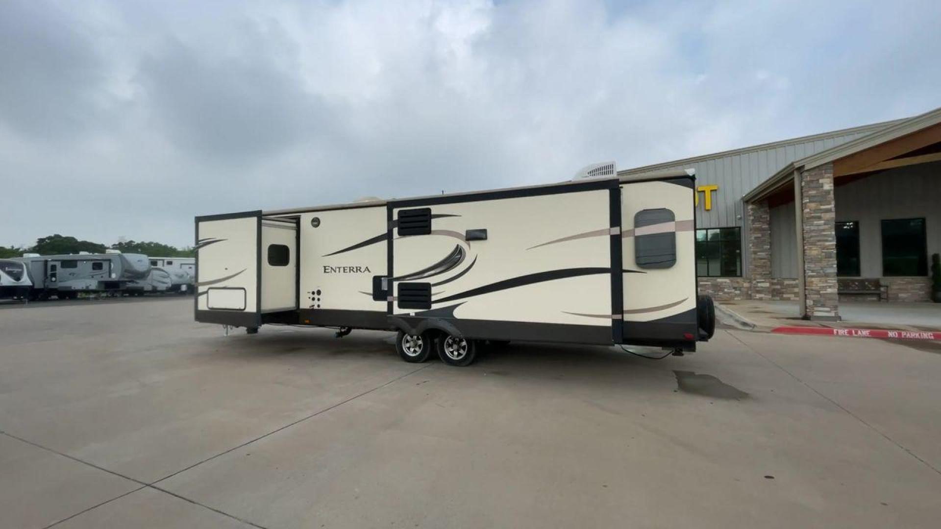 2015 CRUISER ENTERRA 315RLS (5RXTE3126F2) , located at 4319 N Main St, Cleburne, TX, 76033, (817) 678-5133, 32.385960, -97.391212 - The 2015 Cruiser Enterra 315RLS Travel Trailer offers elegance and comfort on the road! This gorgeous trailer provides the ideal balance of design, usefulness, and convenience for your next excursion. The Enterra, which measures 36.75 feet long and weighs 8,030 pounds dry, is both large and lightwei - Photo#7