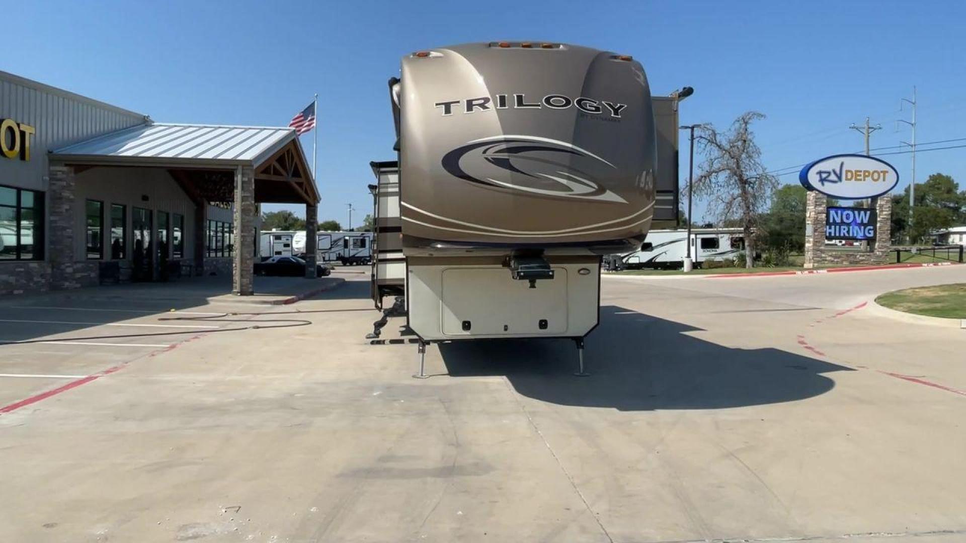 2015 TAN DYNAMAX TRILOGY 37BH - (5ZT3TL2B8FC) , Length: 42 ft. | Dry Weight: 15,638 lbs. | Gross Weight: 18,550 lbs. | Slides: 5 transmission, located at 4319 N Main St, Cleburne, TX, 76033, (817) 678-5133, 32.385960, -97.391212 - Photo#4