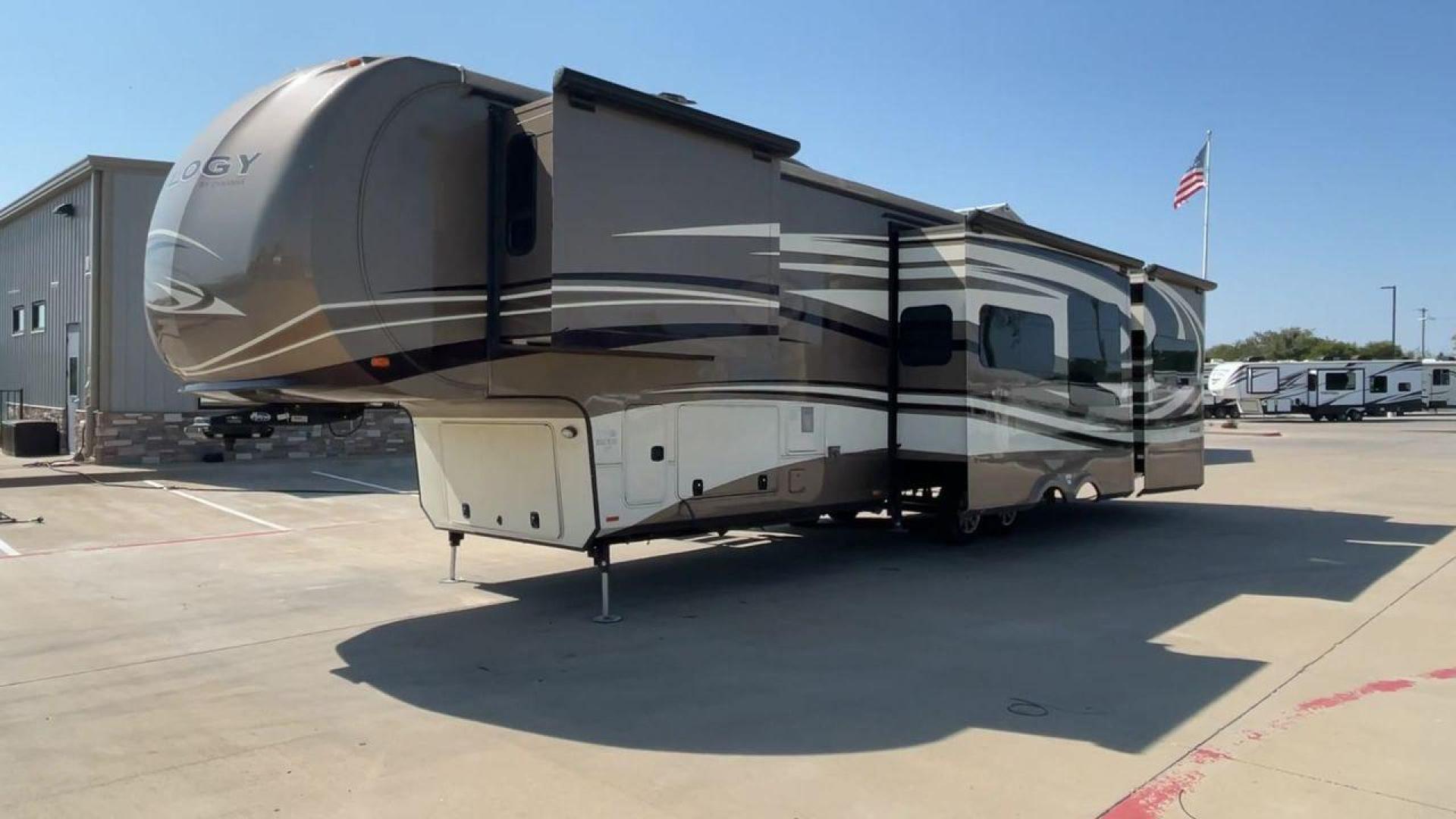 2015 TAN DYNAMAX TRILOGY 37BH - (5ZT3TL2B8FC) , Length: 42 ft. | Dry Weight: 15,638 lbs. | Gross Weight: 18,550 lbs. | Slides: 5 transmission, located at 4319 N Main St, Cleburne, TX, 76033, (817) 678-5133, 32.385960, -97.391212 - Photo#5