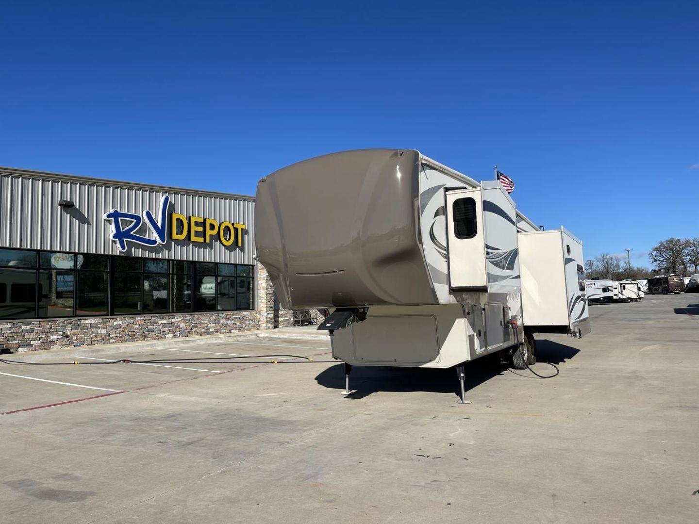 2015 TAN FOREST RIVER CEDAR CREEK 29RE (4X4FCRE21FS) , Length: 33.92 ft. | Dry Weight: 9,790 lbs. | Gross Weight: 13,615 lbs. | Slides: 3 transmission, located at 4319 N Main St, Cleburne, TX, 76033, (817) 678-5133, 32.385960, -97.391212 - Photo#0