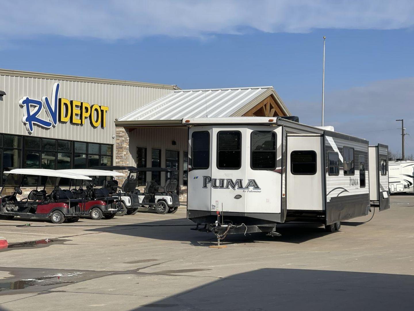 2015 FOREST RIVER PUMA 38PLF (4X4TPUP29FP) , Length: 40.83 ft. | Dry Weight: 9,565 lbs. | Gross Weight: 12,099 lbs. | Slides: 2 transmission, located at 4319 N Main St, Cleburne, TX, 76033, (817) 678-5133, 32.385960, -97.391212 - The 2015 Forest River Puma 38PLF is a spacious destination trailer designed for those who desire the comforts of home while enjoying the great outdoors. With a residential-style layout and thoughtful features, it’s perfect for extended stays or seasonal living. This unit has a length of 40.83 ft i - Photo#0