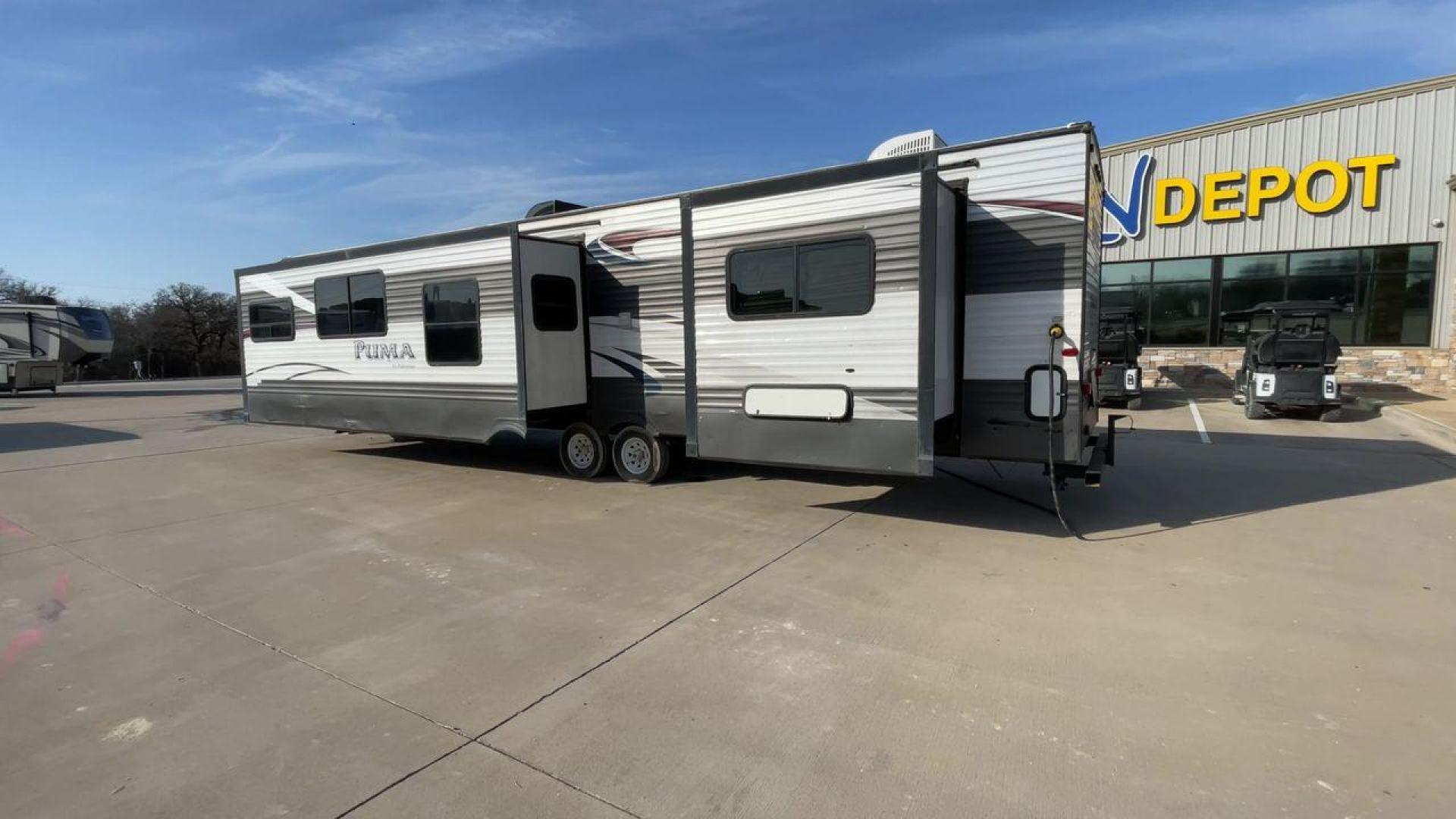 2015 FOREST RIVER PUMA 38PLF (4X4TPUP29FP) , Length: 40.83 ft. | Dry Weight: 9,565 lbs. | Gross Weight: 12,099 lbs. | Slides: 2 transmission, located at 4319 N Main St, Cleburne, TX, 76033, (817) 678-5133, 32.385960, -97.391212 - The 2015 Forest River Puma 38PLF is a spacious destination trailer designed for those who desire the comforts of home while enjoying the great outdoors. With a residential-style layout and thoughtful features, it’s perfect for extended stays or seasonal living. This unit has a length of 40.83 ft i - Photo#7