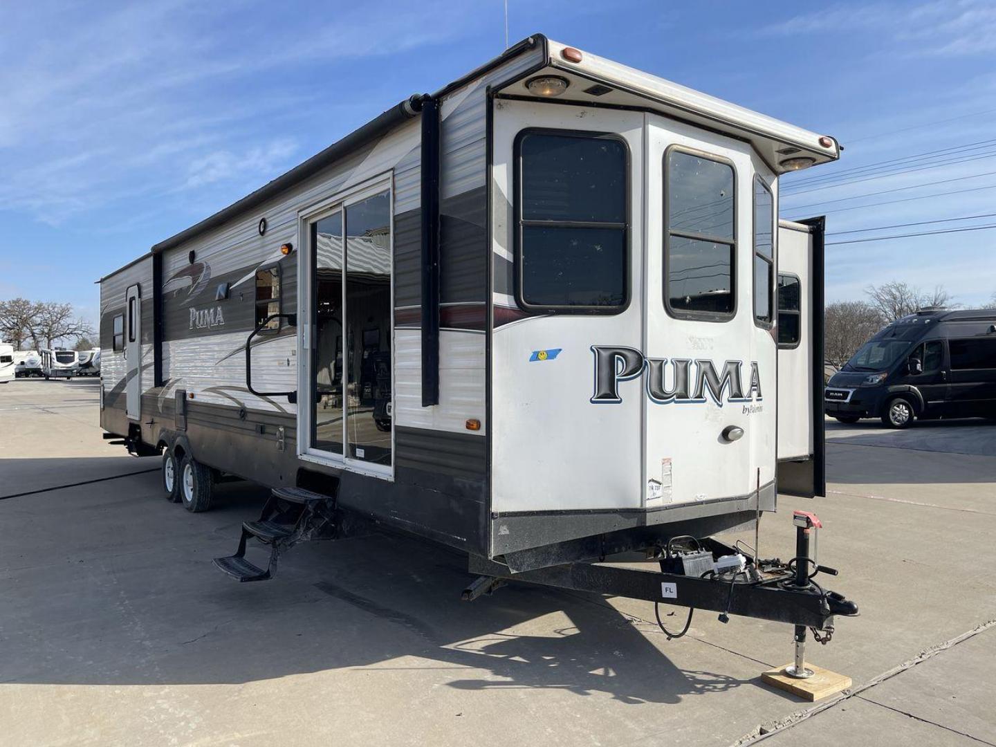 2015 FOREST RIVER PUMA 38PLF (4X4TPUP29FP) , Length: 40.83 ft. | Dry Weight: 9,565 lbs. | Gross Weight: 12,099 lbs. | Slides: 2 transmission, located at 4319 N Main St, Cleburne, TX, 76033, (817) 678-5133, 32.385960, -97.391212 - The 2015 Forest River Puma 38PLF is a spacious destination trailer designed for those who desire the comforts of home while enjoying the great outdoors. With a residential-style layout and thoughtful features, it’s perfect for extended stays or seasonal living. This unit has a length of 40.83 ft i - Photo#22