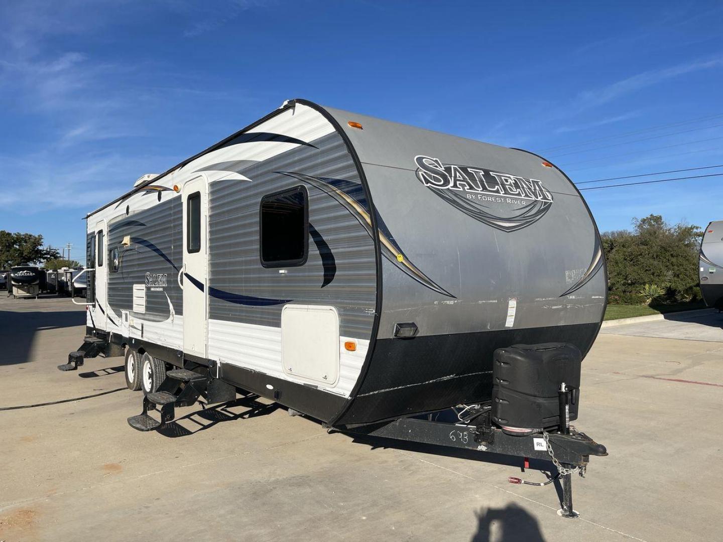 2015 GRAY FOREST RIVER SALEM - (4X4TSMD2XFA) , Length: 31.67 ft. | Dry Weight: 7,394 lbs. | Slides: 2 transmission, located at 4319 N Main St, Cleburne, TX, 76033, (817) 678-5133, 32.385960, -97.391212 - RV Depot in Cleburne, TX is offering a fantastic deal on a 2015 FOREST RIVER SALEM travel trailer. Priced at just $27,995, this spacious and comfortable RV is perfect for those looking to hit the road and explore the local driving highlights around Cleburne, TX. The exterior of this travel trailer - Photo#21