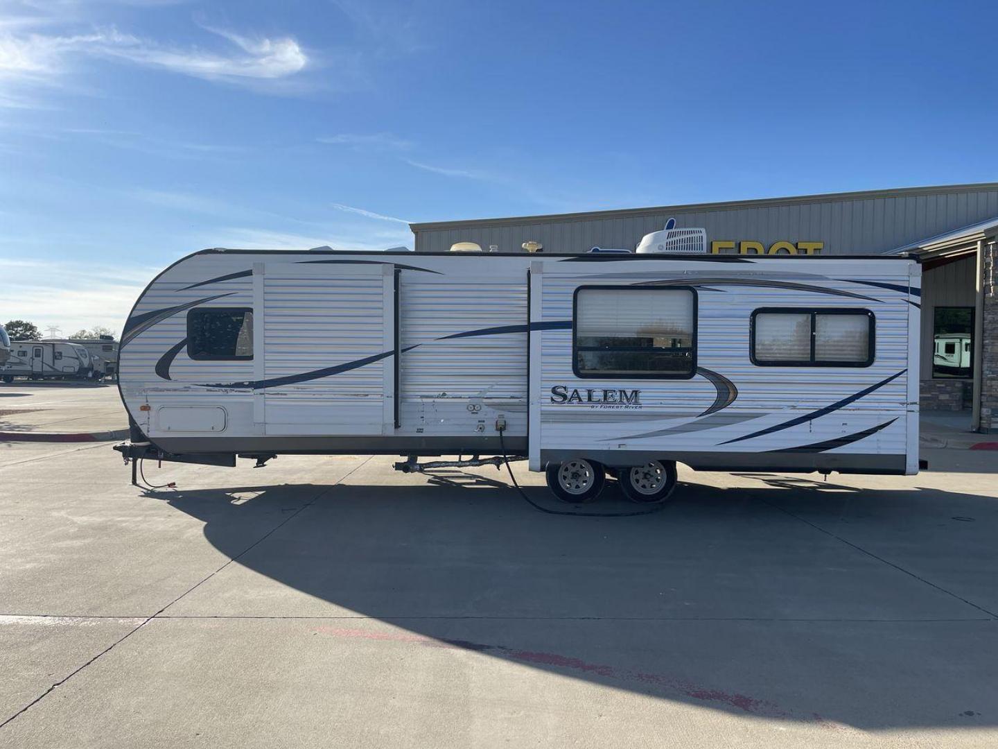 2015 GRAY FOREST RIVER SALEM - (4X4TSMD2XFA) , Length: 31.67 ft. | Dry Weight: 7,394 lbs. | Slides: 2 transmission, located at 4319 N Main St, Cleburne, TX, 76033, (817) 678-5133, 32.385960, -97.391212 - RV Depot in Cleburne, TX is offering a fantastic deal on a 2015 FOREST RIVER SALEM travel trailer. Priced at just $27,995, this spacious and comfortable RV is perfect for those looking to hit the road and explore the local driving highlights around Cleburne, TX. The exterior of this travel trailer - Photo#22