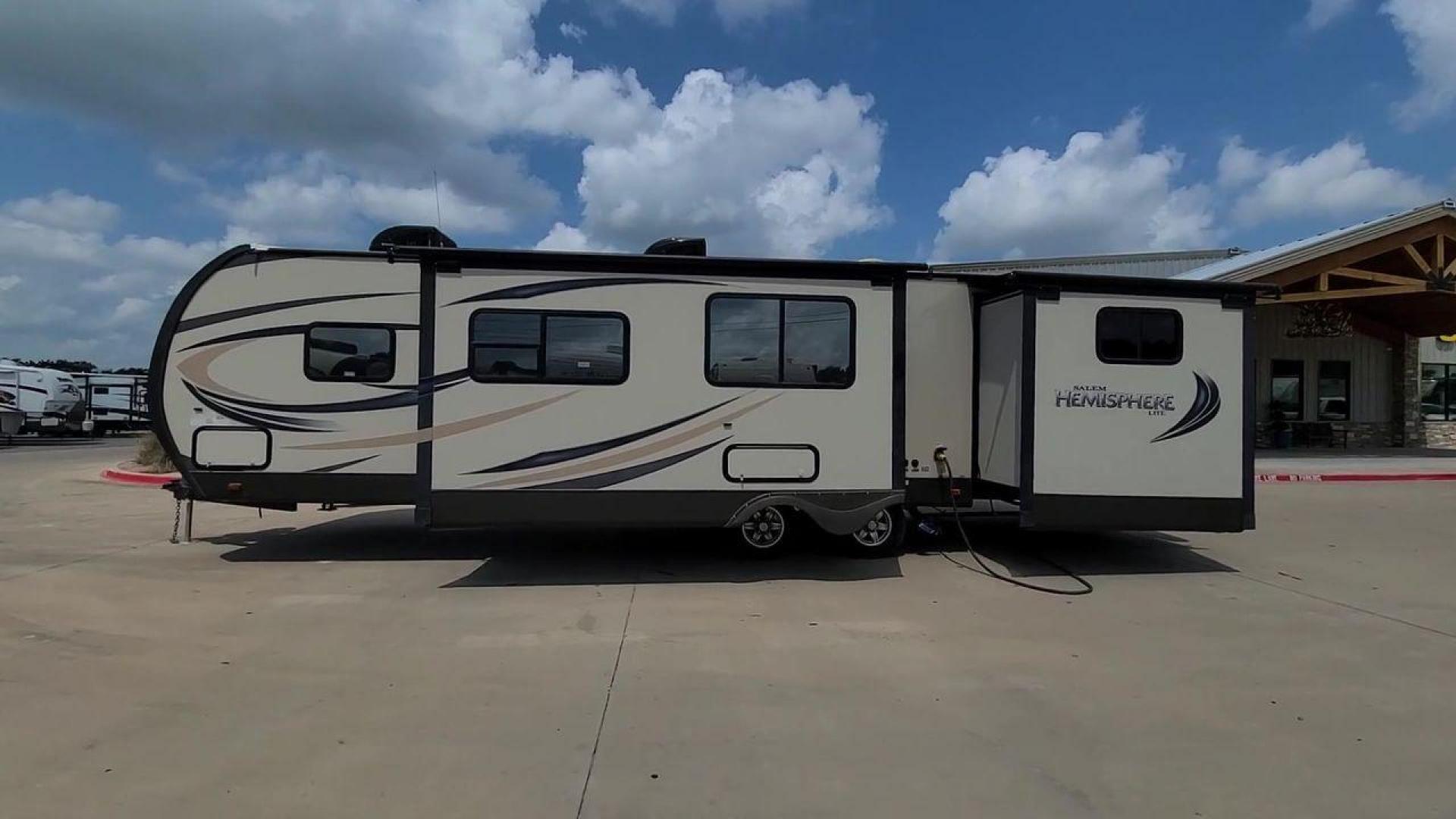 2015 FOREST RIVER SALEM 312QBUD (4X4TSBG22FU) , Length: 35.83 ft. | Dry Weight: 7,150 lbs. | Slides: 2 transmission, located at 4319 N Main St, Cleburne, TX, 76033, (817) 678-5133, 32.385960, -97.391212 - Take advantage of the 2015 Forest River Salem 312QBUD Travel Trailer and embrace your spirit of adventure. Comfort and practicality come together in this travel trailer, which is perfect for families or parties looking for a roomy and luxurious home on wheels for amazing camping excursions. This - Photo#2