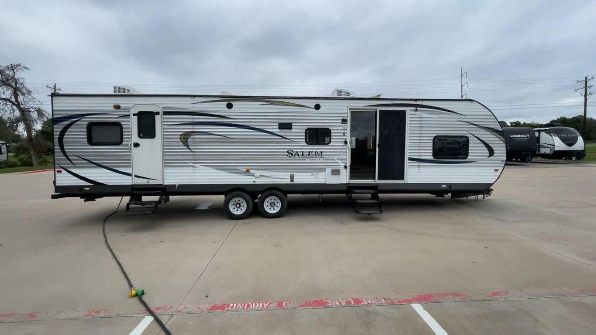 2015 FOREST RIVER SALEM 36BHBS (4X4TSMM24FA) , Length: 36.58 ft. | Dry Weight: 7,892 lbs. | Slides: 2 transmission, located at 4319 N Main St, Cleburne, TX, 76033, (817) 678-5133, 32.385960, -97.391212 - The 2015 Forest River Salem 36BHBS is a spacious and versatile travel trailer designed for comfort and convenience during family adventures. With a length of 36.58 feet and a dry weight of 7,892 lbs., this model offers ample living space and features that make it perfect for long vacations or weeken - Photo#2