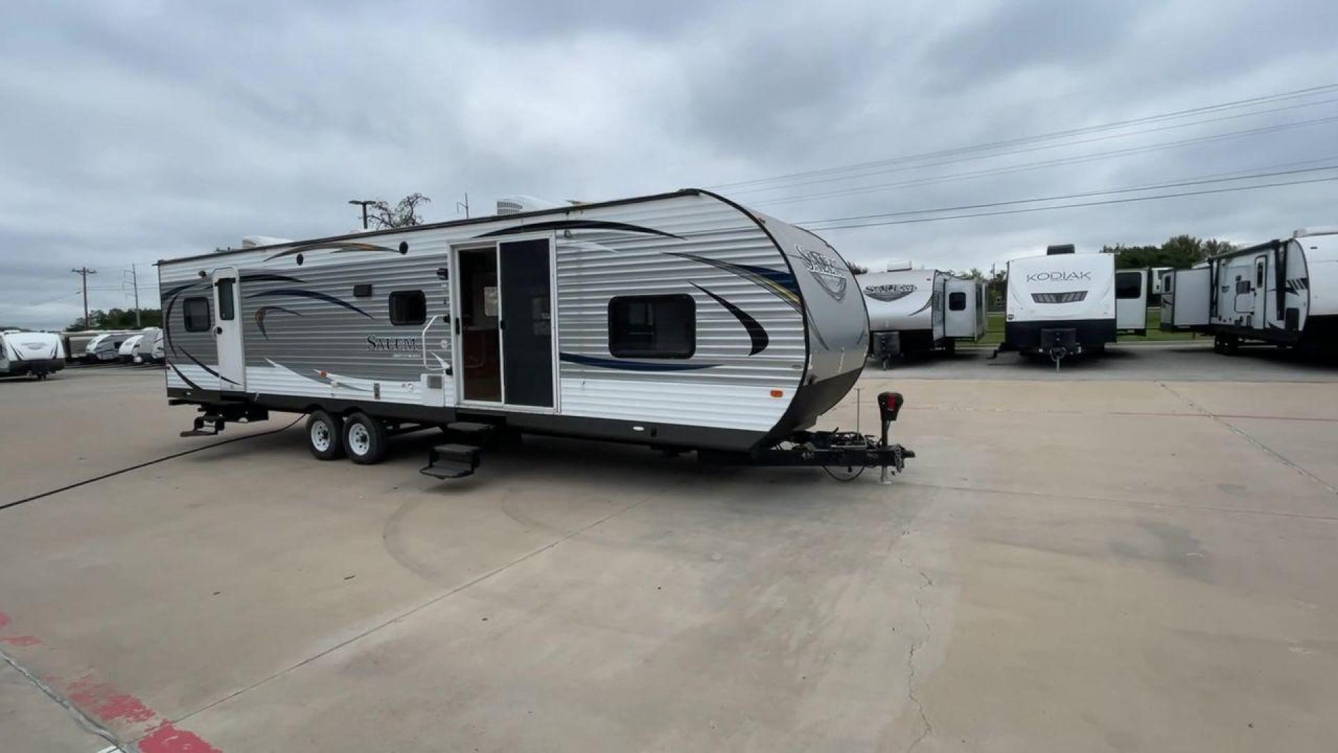 2015 FOREST RIVER SALEM 36BHBS (4X4TSMM24FA) , Length: 36.58 ft. | Dry Weight: 7,892 lbs. | Slides: 2 transmission, located at 4319 N Main St, Cleburne, TX, 76033, (817) 678-5133, 32.385960, -97.391212 - The 2015 Forest River Salem 36BHBS is a spacious and versatile travel trailer designed for comfort and convenience during family adventures. With a length of 36.58 feet and a dry weight of 7,892 lbs., this model offers ample living space and features that make it perfect for long vacations or weeken - Photo#3