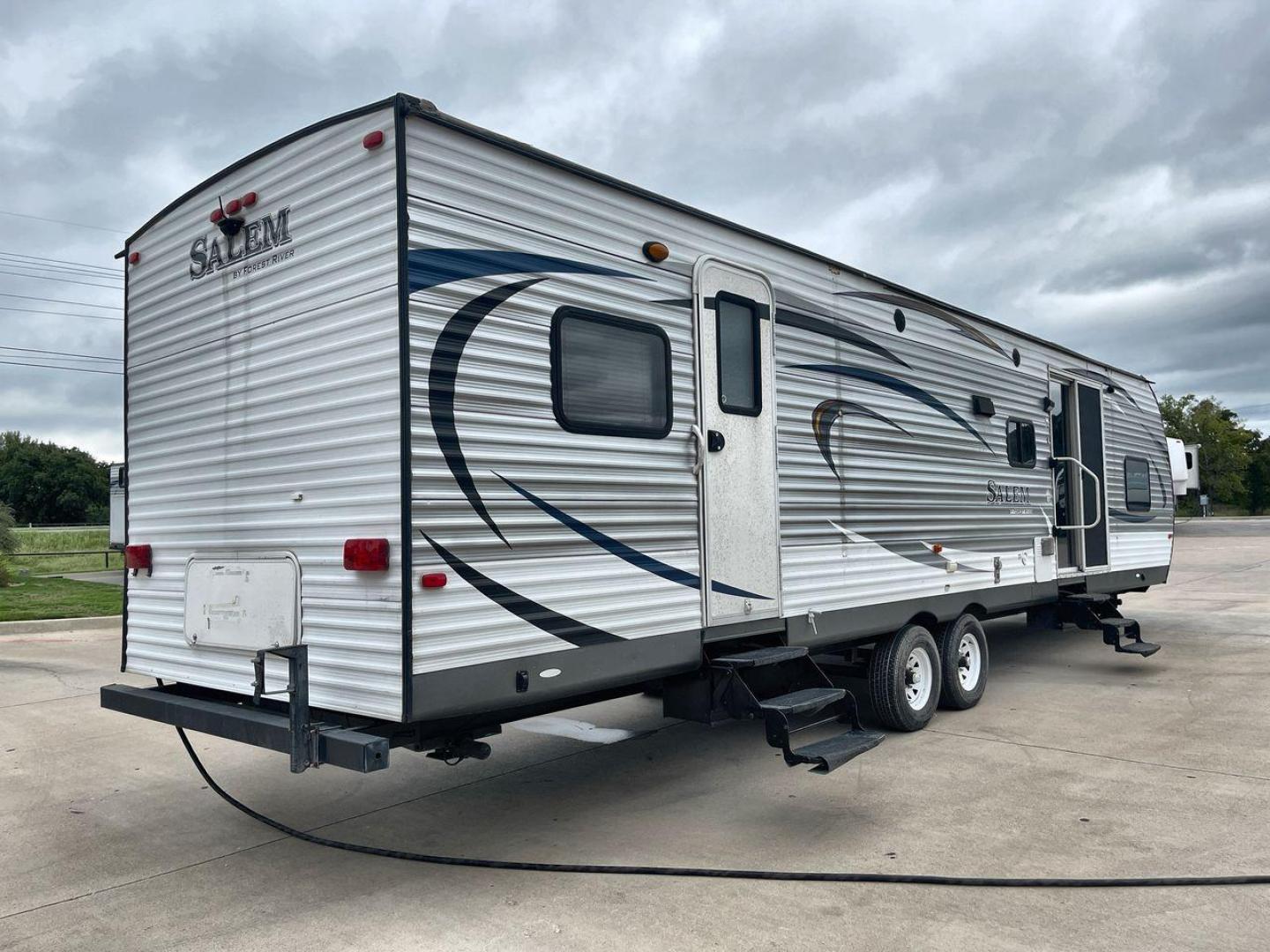 2015 FOREST RIVER SALEM 36BHBS (4X4TSMM24FA) , Length: 36.58 ft. | Dry Weight: 7,892 lbs. | Slides: 2 transmission, located at 4319 N Main St, Cleburne, TX, 76033, (817) 678-5133, 32.385960, -97.391212 - The 2015 Forest River Salem 36BHBS is a spacious and versatile travel trailer designed for comfort and convenience during family adventures. With a length of 36.58 feet and a dry weight of 7,892 lbs., this model offers ample living space and features that make it perfect for long vacations or weeken - Photo#25