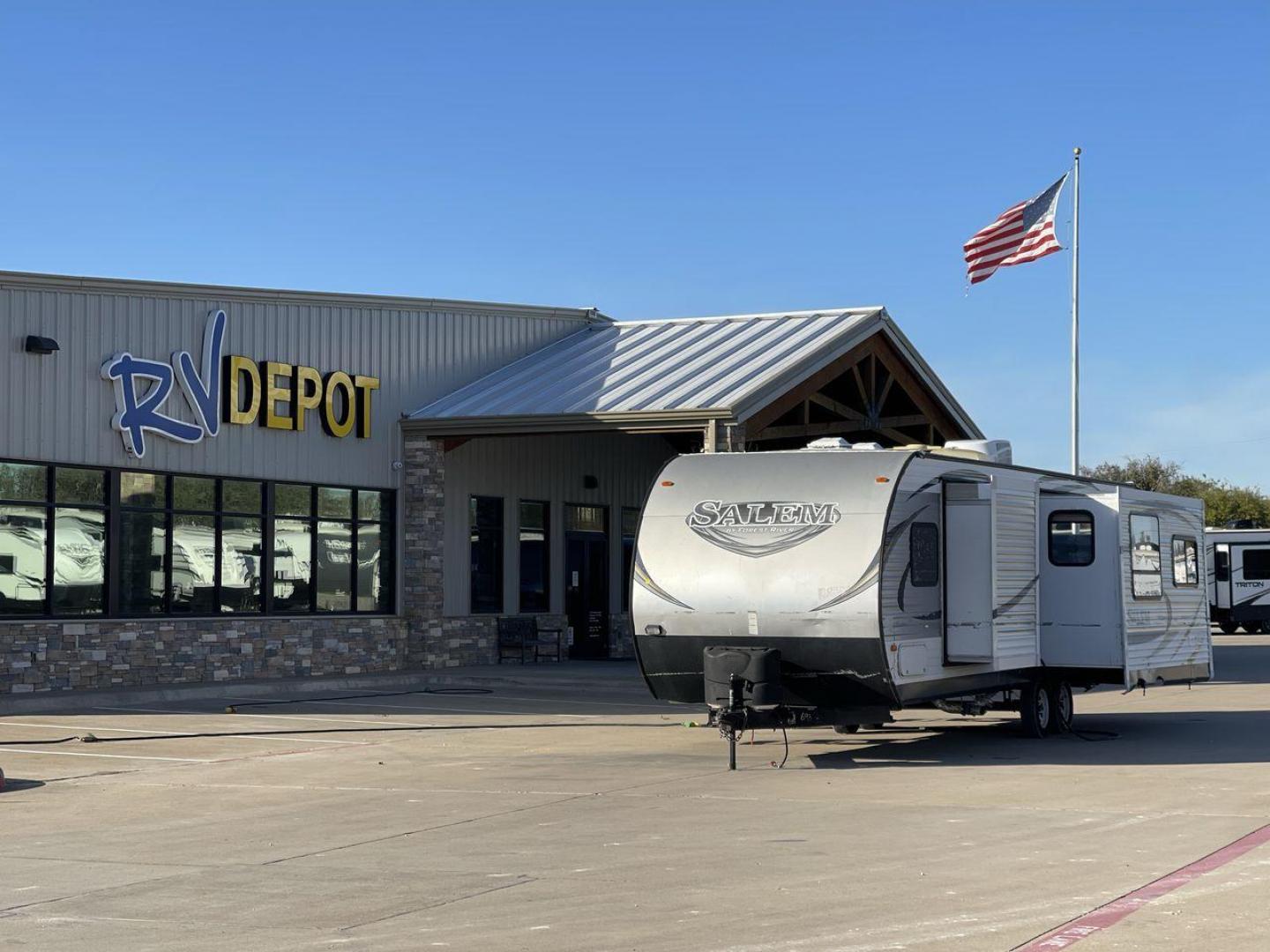 2015 GRAY FOREST RIVER SALEM - (4X4TSMD2XFA) , Length: 31.67 ft. | Dry Weight: 7,394 lbs. | Slides: 2 transmission, located at 4319 N Main St, Cleburne, TX, 76033, (817) 678-5133, 32.385960, -97.391212 - RV Depot in Cleburne, TX is offering a fantastic deal on a 2015 FOREST RIVER SALEM travel trailer. Priced at just $27,995, this spacious and comfortable RV is perfect for those looking to hit the road and explore the local driving highlights around Cleburne, TX. The exterior of this travel trailer - Photo#0