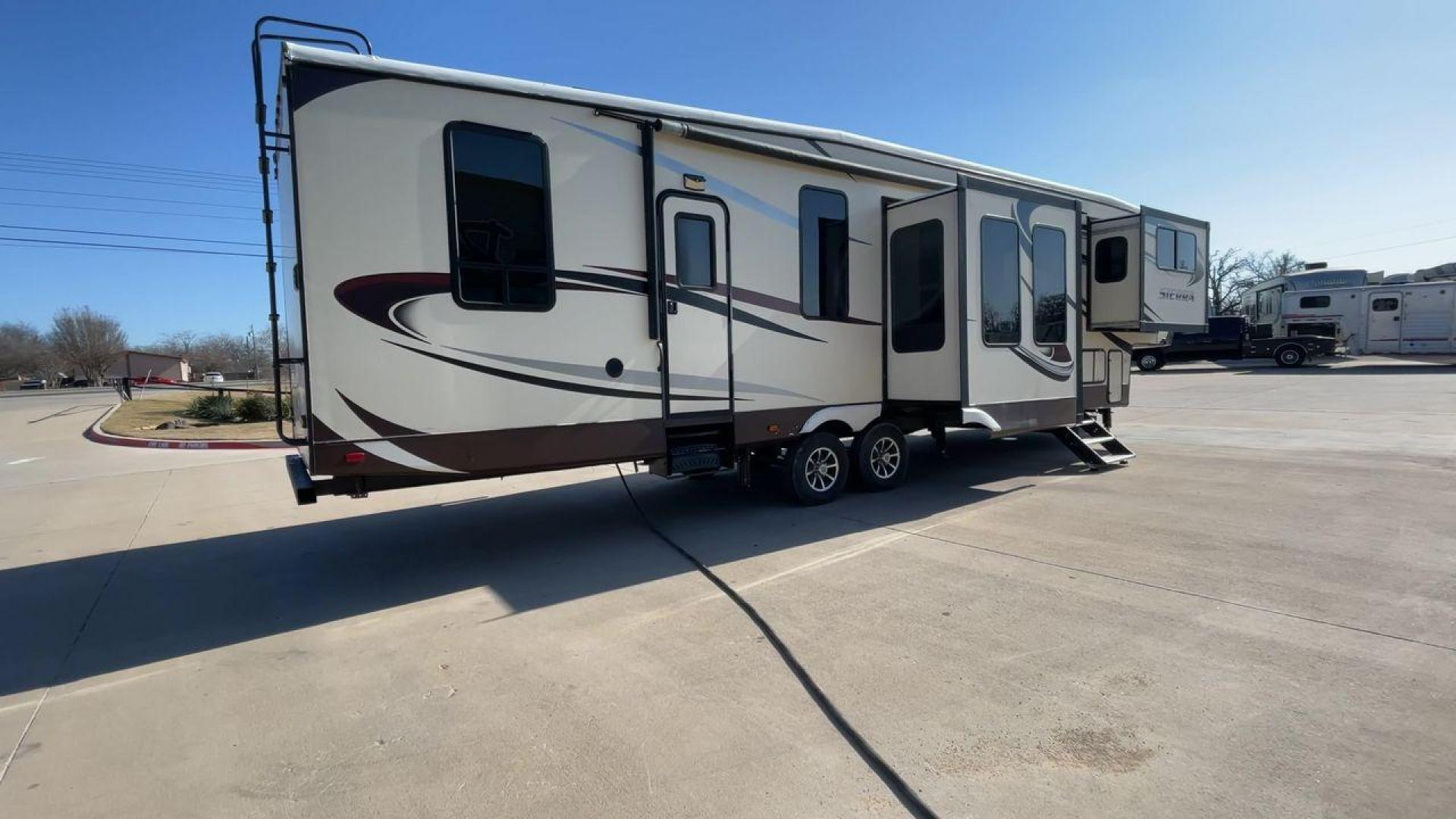 2015 TAN FOREST RIVER SIERRA 377FLIK (4X4FSEP20FJ) , Length: 41.67 ft. | Dry Weight: 11,821 lbs. | Gross Weight: 15,500 lbs. | Slides: 5 transmission, located at 4319 N Main St, Cleburne, TX, 76033, (817) 678-5133, 32.385960, -97.391212 - Photo#1