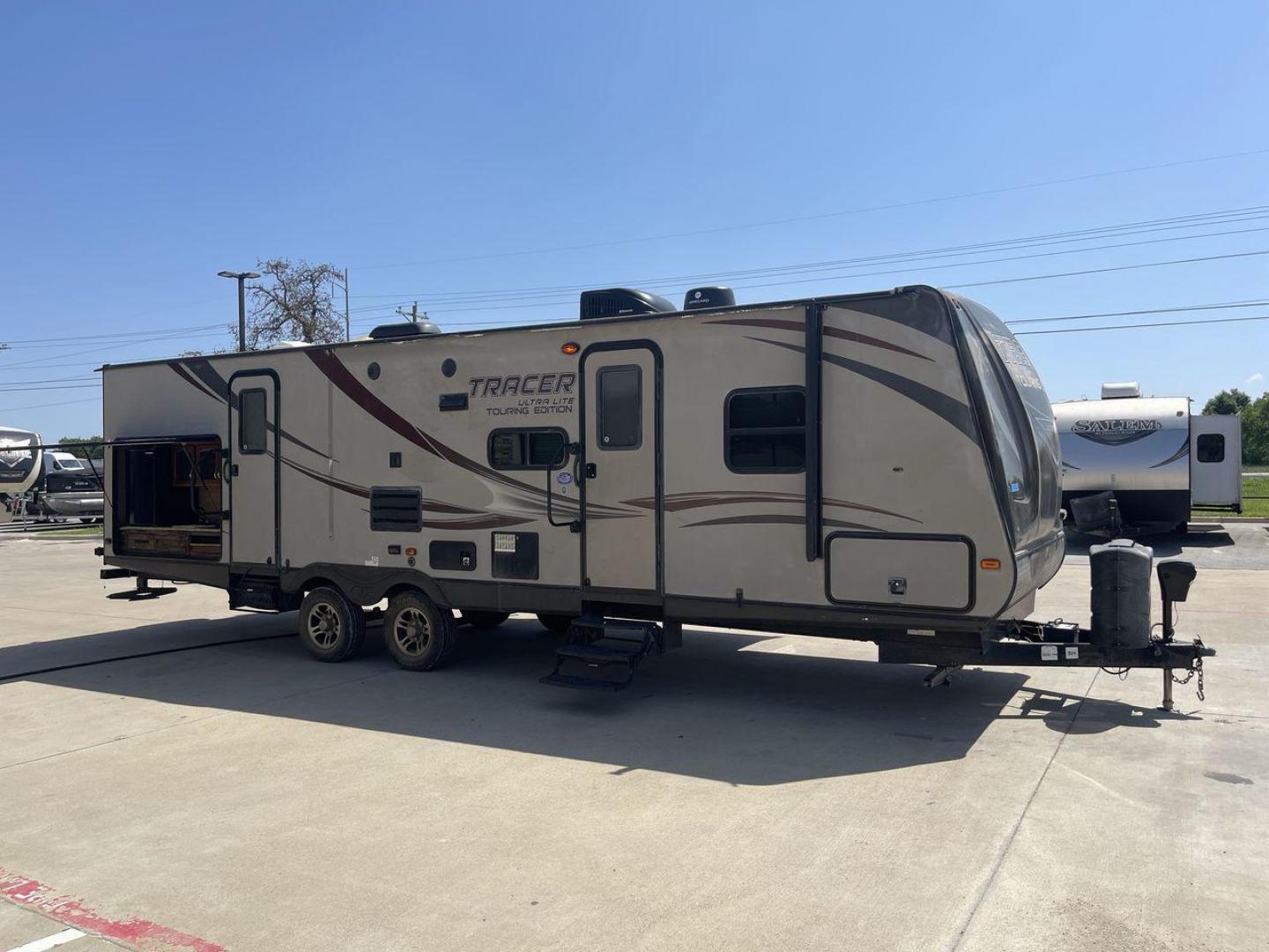 2015 WHITE FOREST RIVER TRACER 3150BHD (5ZT2TRXB5FB) , Length: 34 ft. | Dry Weight: 6,955 lbs. | Slides: 2 transmission, located at 4319 N Main St, Cleburne, TX, 76033, (817) 678-5133, 32.385960, -97.391212 - In this 2015 Forest River Tracer 3150BHD, you are guaranteed more campers, more features, and more fun! This travel trailer measures exactly 34 ft. in length with a dry weight of 6,955 lbs. and a payload capacity of 2,755 lbs. It includes two doors, two slides, and one awning. This model featu - Photo#24