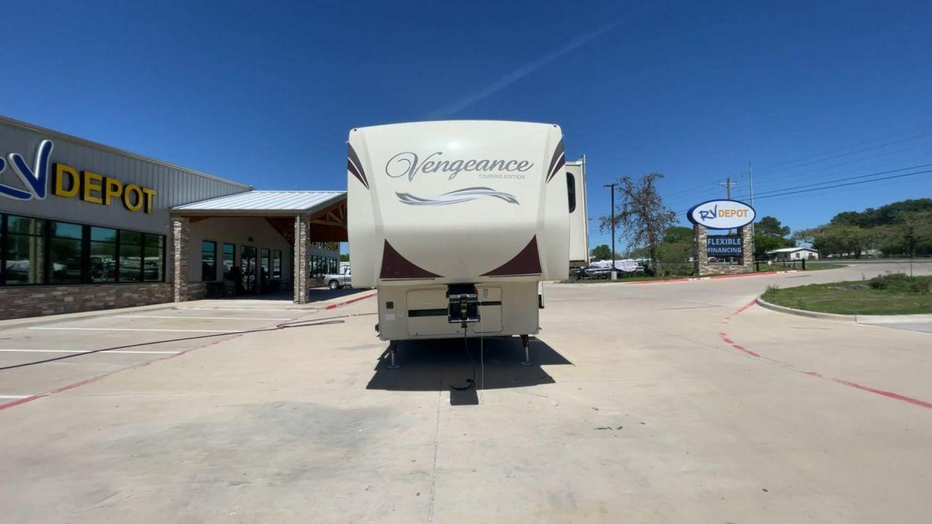 2015 TAN FOREST RIVER VENGEANCE - (4X4FVGR30FR) , Length: 42.83 ft. | Dry Weight: 14,270 lbs. | Gross Weight: 17,500 lbs. | Slides: 3 transmission, located at 4319 N Main St, Cleburne, TX, 76033, (817) 678-5133, 32.385960, -97.391212 - Designed to provide comfort and adventure to your travels, the 2015 Forest River Vengeance 39B12 is a tough and adaptable fifth wheel toy hauler. With a dry weight of 14,270 pounds and a length of a little over 42 feet, this model offers plenty of room for your belongings while still being towable - Photo#4