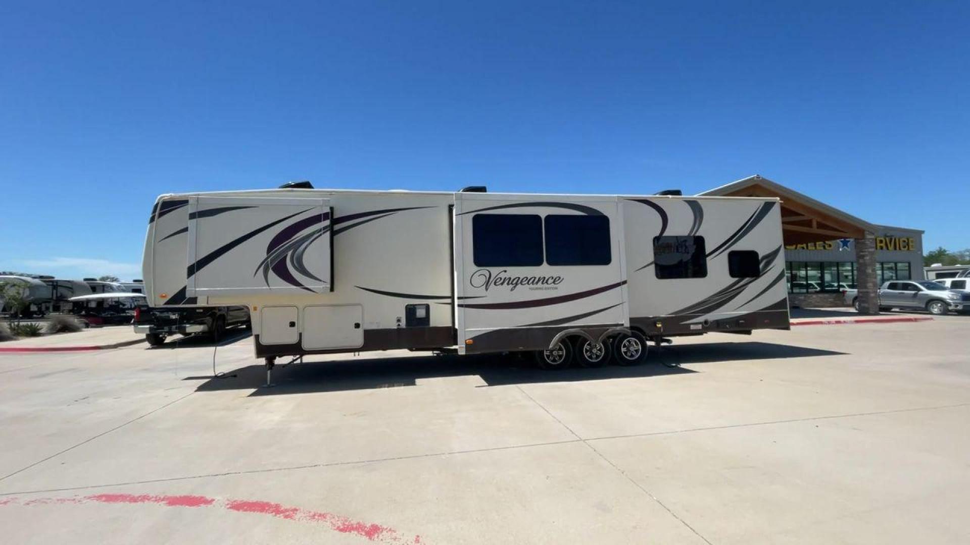 2015 TAN FOREST RIVER VENGEANCE - (4X4FVGR30FR) , Length: 42.83 ft. | Dry Weight: 14,270 lbs. | Gross Weight: 17,500 lbs. | Slides: 3 transmission, located at 4319 N Main St, Cleburne, TX, 76033, (817) 678-5133, 32.385960, -97.391212 - Designed to provide comfort and adventure to your travels, the 2015 Forest River Vengeance 39B12 is a tough and adaptable fifth wheel toy hauler. With a dry weight of 14,270 pounds and a length of a little over 42 feet, this model offers plenty of room for your belongings while still being towable - Photo#6