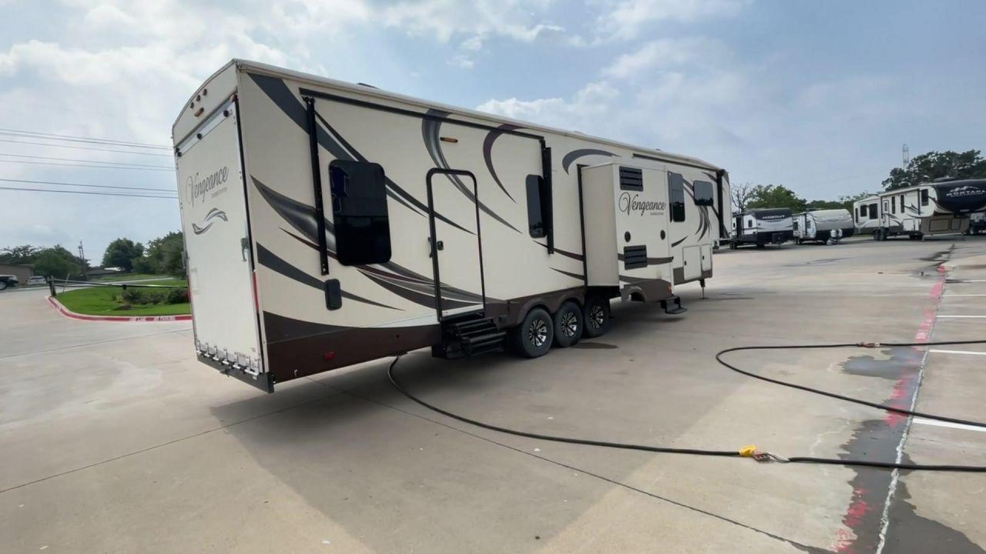 2015 TAN FOREST RIVER VENGEANCE 39B12 - (4X4FVGR32FR) , Length: 42.83 ft. | Dry Weight: 14,270 lbs. | Gross Weight: 17,500 lbs. | Slides: 3 transmission, located at 4319 N Main St, Cleburne, TX, 76033, (817) 678-5133, 32.385960, -97.391212 - This beautiful trailer is 42.83 feet long, so it has plenty of space for all of your camping stuff and everyday things. With a dry weight of 14,270 pounds and a gross weight of 17,500 pounds, it's just the right amount of strong and handy for your trips. When you go inside, you'll find a luxury spac - Photo#1