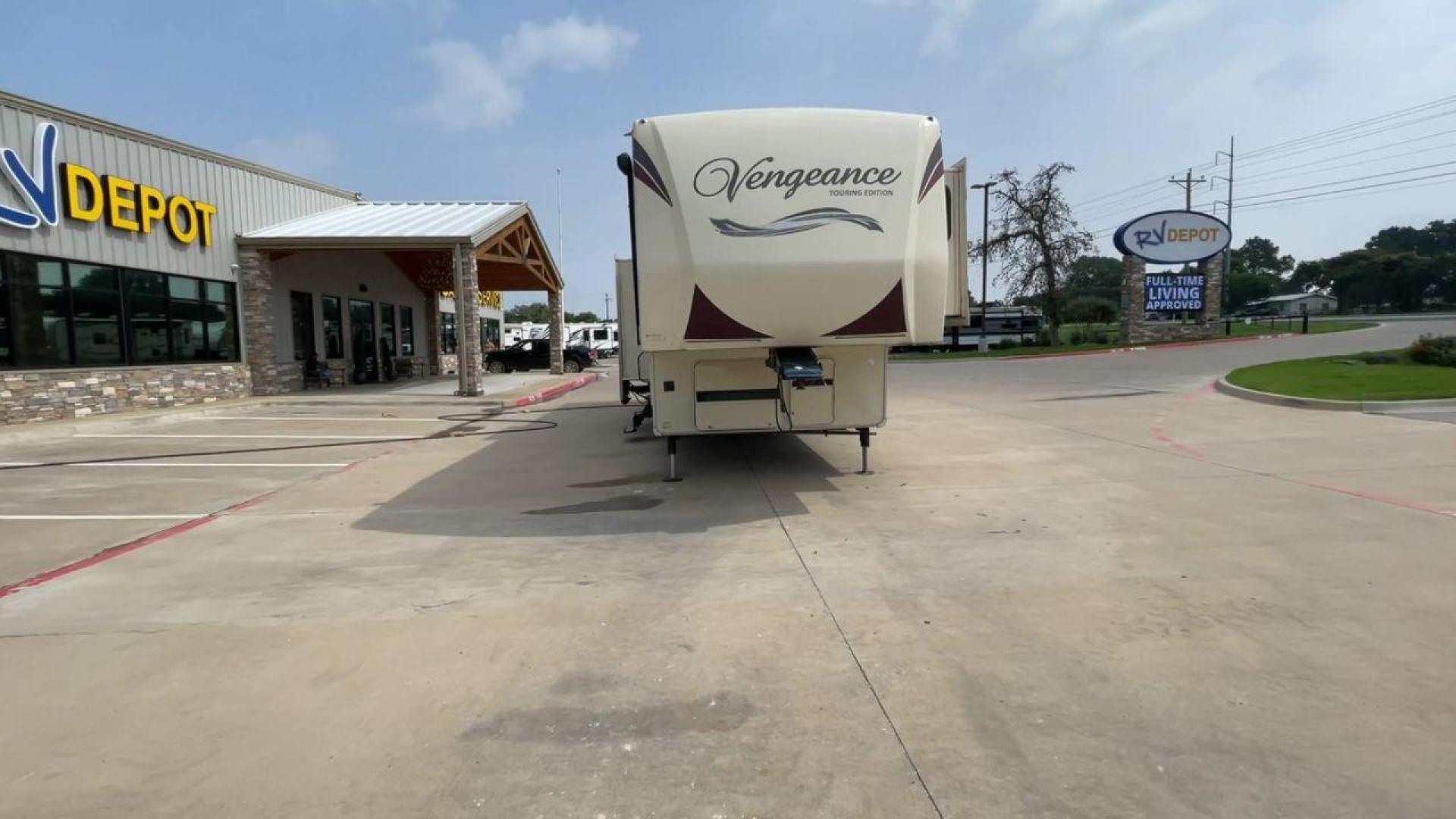 2015 TAN FOREST RIVER VENGEANCE 39B12 - (4X4FVGR32FR) , Length: 42.83 ft. | Dry Weight: 14,270 lbs. | Gross Weight: 17,500 lbs. | Slides: 3 transmission, located at 4319 N Main St, Cleburne, TX, 76033, (817) 678-5133, 32.385960, -97.391212 - This beautiful trailer is 42.83 feet long, so it has plenty of space for all of your camping stuff and everyday things. With a dry weight of 14,270 pounds and a gross weight of 17,500 pounds, it's just the right amount of strong and handy for your trips. When you go inside, you'll find a luxury spac - Photo#4