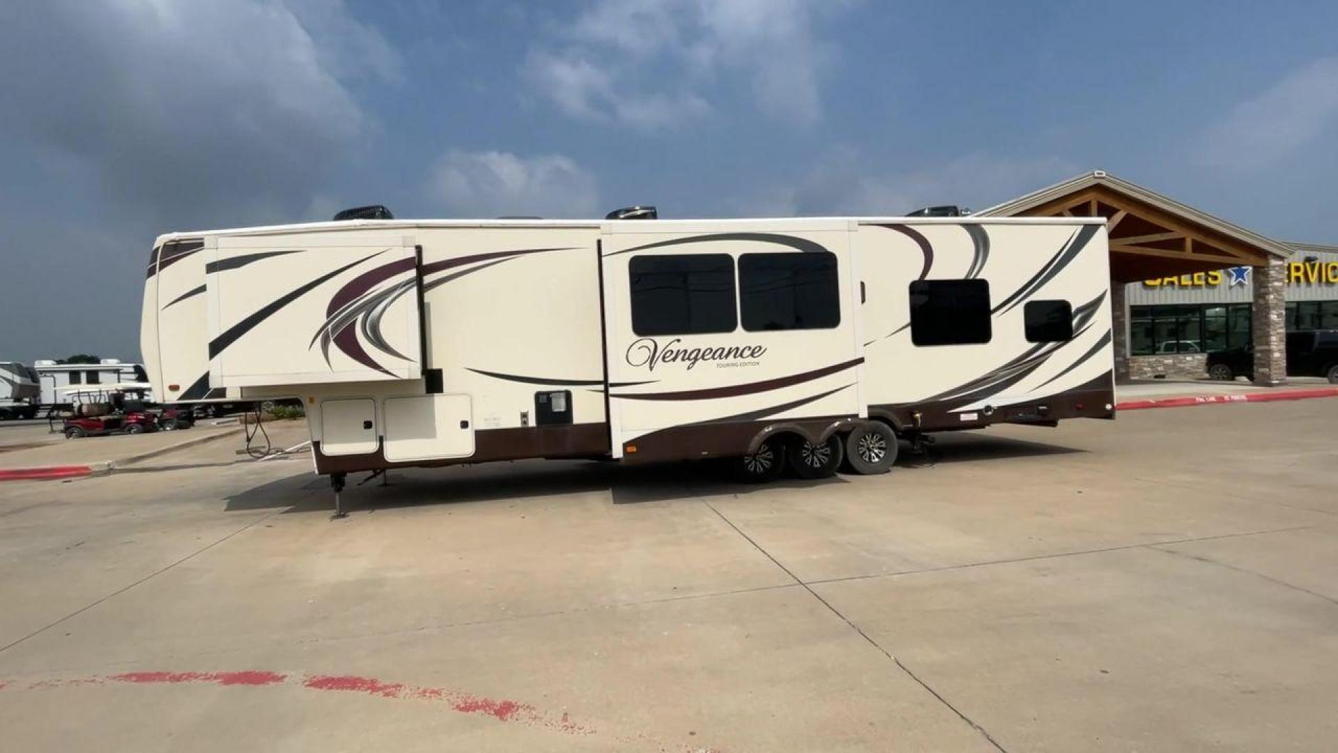 2015 TAN FOREST RIVER VENGEANCE 39B12 - (4X4FVGR32FR) , Length: 42.83 ft. | Dry Weight: 14,270 lbs. | Gross Weight: 17,500 lbs. | Slides: 3 transmission, located at 4319 N Main St, Cleburne, TX, 76033, (817) 678-5133, 32.385960, -97.391212 - This beautiful trailer is 42.83 feet long, so it has plenty of space for all of your camping stuff and everyday things. With a dry weight of 14,270 pounds and a gross weight of 17,500 pounds, it's just the right amount of strong and handy for your trips. When you go inside, you'll find a luxury spac - Photo#6