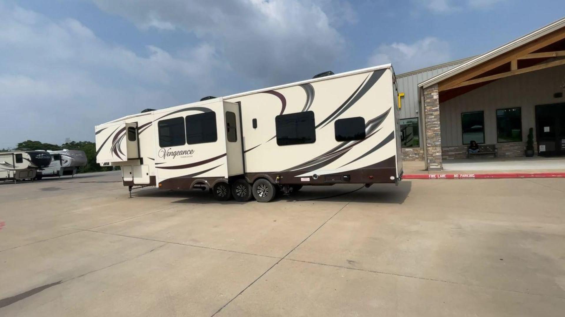 2015 TAN FOREST RIVER VENGEANCE 39B12 - (4X4FVGR32FR) , Length: 42.83 ft. | Dry Weight: 14,270 lbs. | Gross Weight: 17,500 lbs. | Slides: 3 transmission, located at 4319 N Main St, Cleburne, TX, 76033, (817) 678-5133, 32.385960, -97.391212 - This beautiful trailer is 42.83 feet long, so it has plenty of space for all of your camping stuff and everyday things. With a dry weight of 14,270 pounds and a gross weight of 17,500 pounds, it's just the right amount of strong and handy for your trips. When you go inside, you'll find a luxury spac - Photo#7