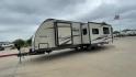 2015 TAN FREEDOM EXPRESS 305RKDS (5ZT2FEWB1FA) , Length: 34.5 ft. | Dry Weight: 6,199 lbs | Gross Weight: 9,500 lbs. | Slides: 2 transmission, located at 4319 N Main St, Cleburne, TX, 76033, (817) 678-5133, 32.385960, -97.391212 - The 2015 Freedom Express 305RKDS is a travel trailer designed to deliver an exceptional camping experience, combining freedom and comfort in every detail. It boasts a rear kitchen layout, providing a unique and functional living space. The rear kitchen is equipped with high-end appliances, ample cou - Photo#0