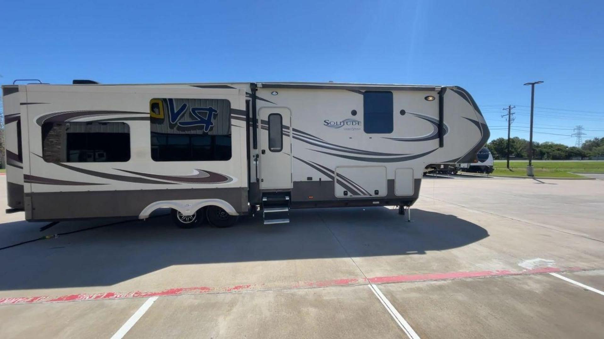 2015 GRAND DESIGN SOLITUDE 369RL (573FS3820F1) , Length: 38.92 ft. | Dry Weight: 12,650 lbs. | Gross Weight: 16,000 lbs. | Slides: 3 transmission, located at 4319 N Main St, Cleburne, TX, 76033, (817) 678-5133, 32.385960, -97.391212 - Photo#2