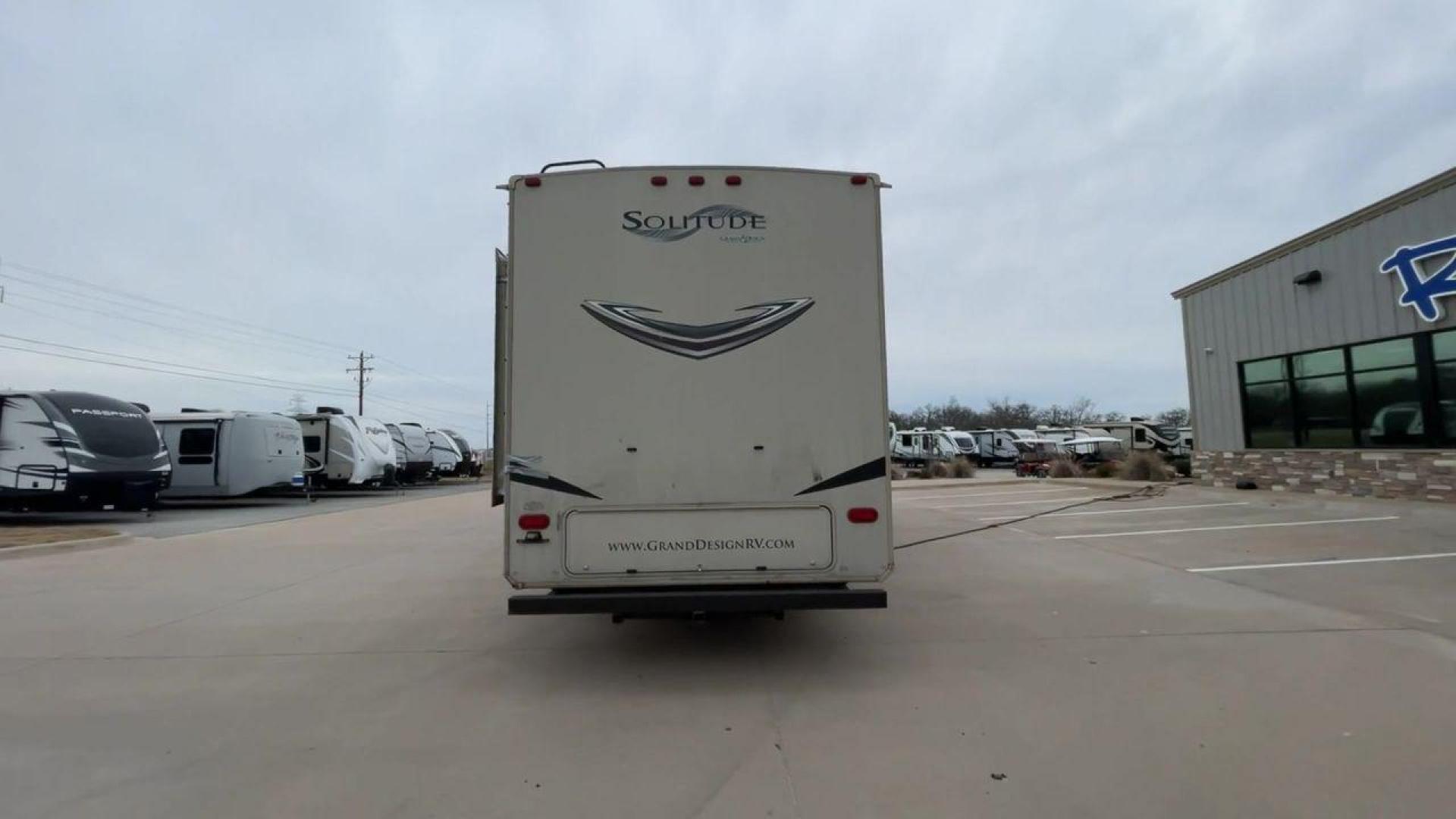 2015 BEIGE GRAND DESIGN SOLITUDE 379FL (573FS4325F1) , Length: 42.5 ft. | Dry Weight: 13,800 lbs. | Gross Weight: 16,000 lbs. | Slides: 5 transmission, located at 4319 N Main St, Cleburne, TX, 76033, (817) 678-5133, 32.385960, -97.391212 - This 2015 GRSL Solitude 379 fifth wheel measures just over 42' in length. It is a dual axle and aluminum wheel setup with a GCWR of 16,000 lbs and a carrying capacity of 2,200 lbs. With five slides, this fifth wheel is spacious and comfortable! The Solitude's exterior is made from fiberglass, finish - Photo#8