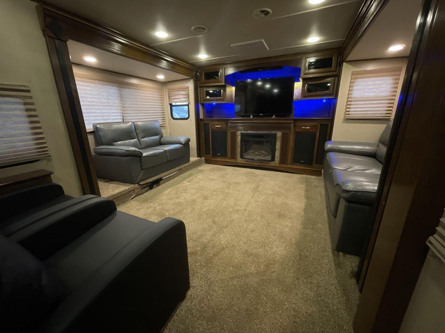 2015 BEIGE GRAND DESIGN SOLITUDE 379FL (573FS4325F1) , Length: 42.5 ft. | Dry Weight: 13,800 lbs. | Gross Weight: 16,000 lbs. | Slides: 5 transmission, located at 4319 N Main St, Cleburne, TX, 76033, (817) 678-5133, 32.385960, -97.391212 - This 2015 GRSL Solitude 379 fifth wheel measures just over 42' in length. It is a dual axle and aluminum wheel setup with a GCWR of 16,000 lbs and a carrying capacity of 2,200 lbs. With five slides, this fifth wheel is spacious and comfortable! The Solitude's exterior is made from fiberglass, finish - Photo#10