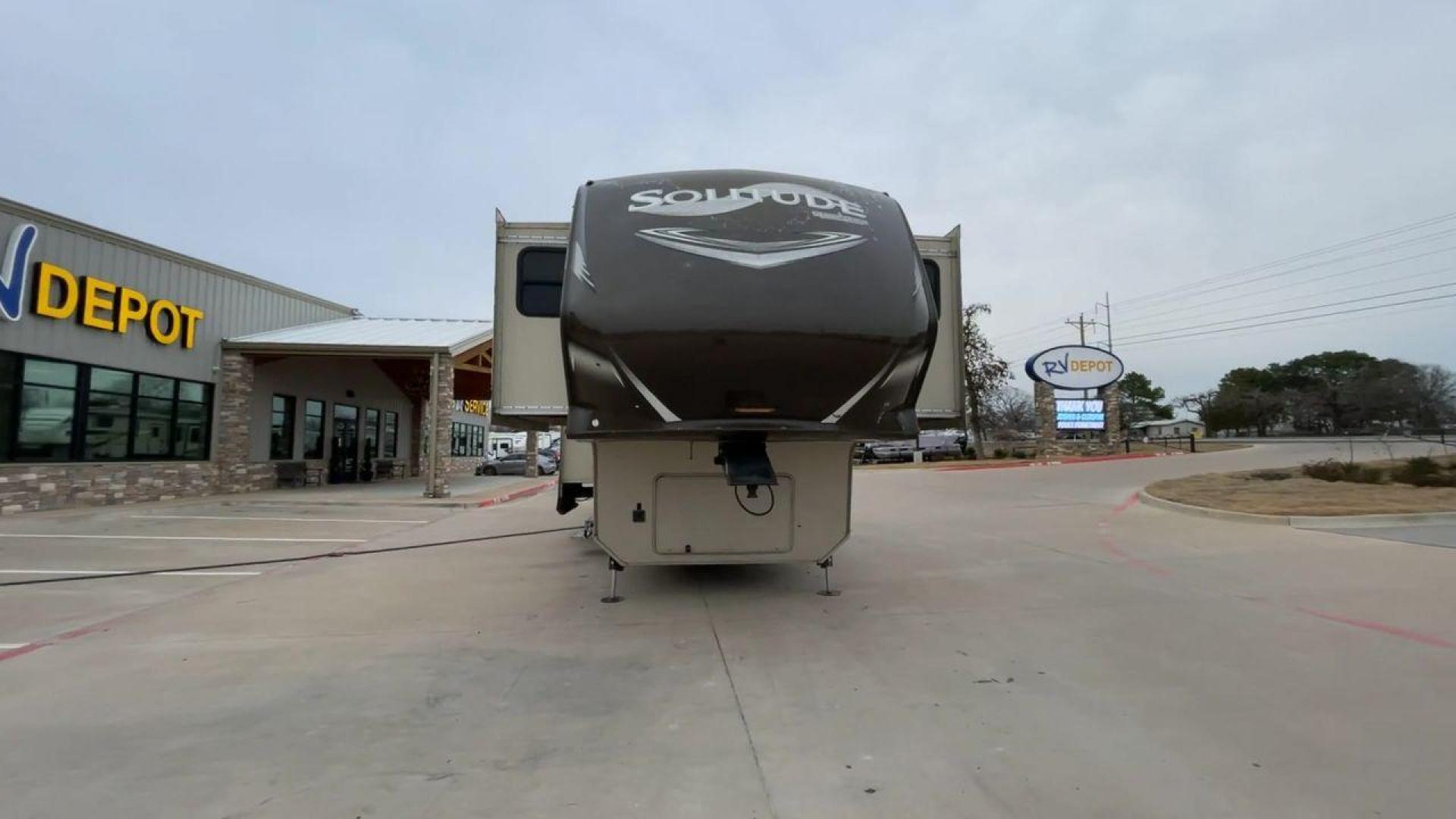 2015 BEIGE GRAND DESIGN SOLITUDE 379FL (573FS4325F1) , Length: 42.5 ft. | Dry Weight: 13,800 lbs. | Gross Weight: 16,000 lbs. | Slides: 5 transmission, located at 4319 N Main St, Cleburne, TX, 76033, (817) 678-5133, 32.385960, -97.391212 - This 2015 GRSL Solitude 379 fifth wheel measures just over 42' in length. It is a dual axle and aluminum wheel setup with a GCWR of 16,000 lbs and a carrying capacity of 2,200 lbs. With five slides, this fifth wheel is spacious and comfortable! The Solitude's exterior is made from fiberglass, finish - Photo#4