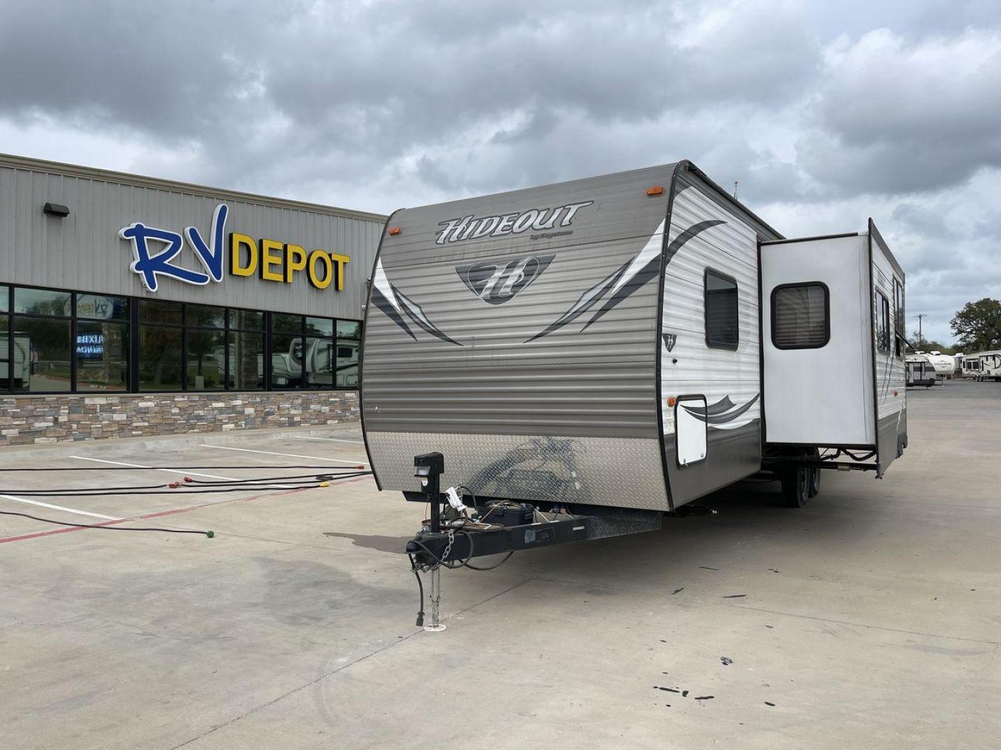 2015 KEYSTONE HIDEOUT 29BHS (4YDT29B23F7) , Length: 34.25 ft. | Dry Weight: 7,225 lbs. | Gross Weight: 9,675 lbs. | Slides: 1 transmission, located at 4319 N Main St, Cleburne, TX, 76033, (817) 678-5133, 32.385960, -97.391212 - Photo#0