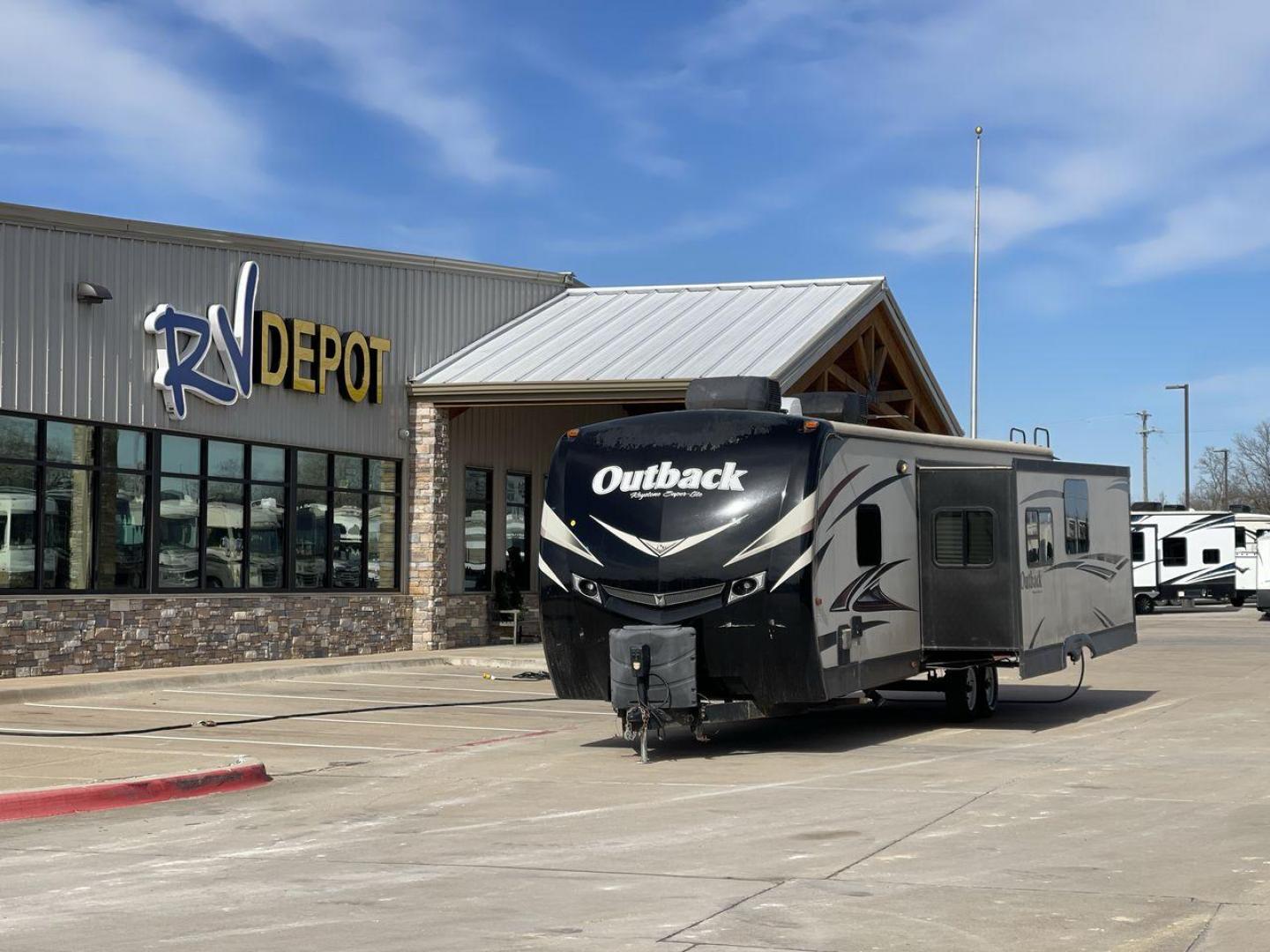 2015 TAN KEYSTONE OUTBACK 323BH (4YDT32321FB) , Length: 36 ft. | Dry Weight: 8,190 lbs. | Gross Weight: 9,500 lbs. | Slides: 2 transmission, located at 4319 N Main St, Cleburne, TX, 76033, (817) 678-5133, 32.385960, -97.391212 - Photo#0