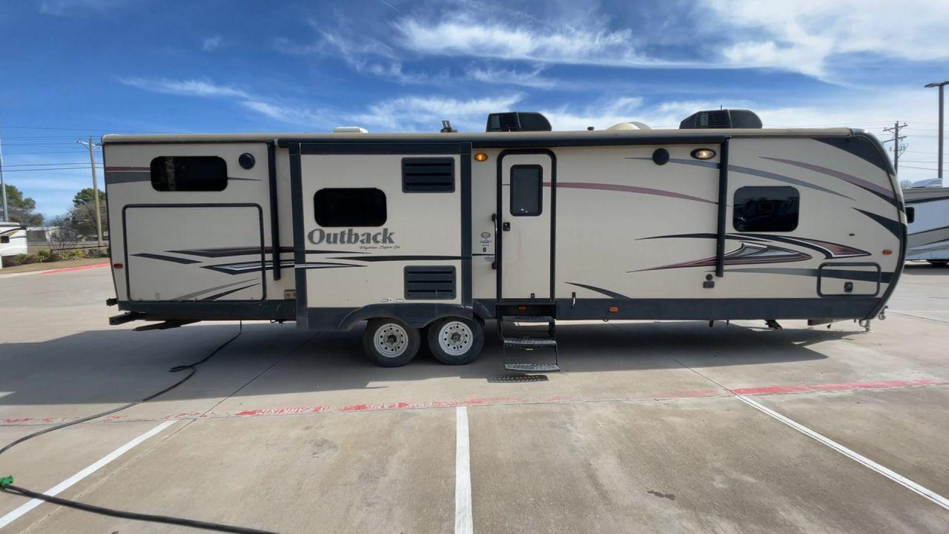 2015 TAN KEYSTONE OUTBACK 323BH (4YDT32321FB) , Length: 36 ft. | Dry Weight: 8,190 lbs. | Gross Weight: 9,500 lbs. | Slides: 2 transmission, located at 4319 N Main St, Cleburne, TX, 76033, (817) 678-5133, 32.385960, -97.391212 - Photo#2