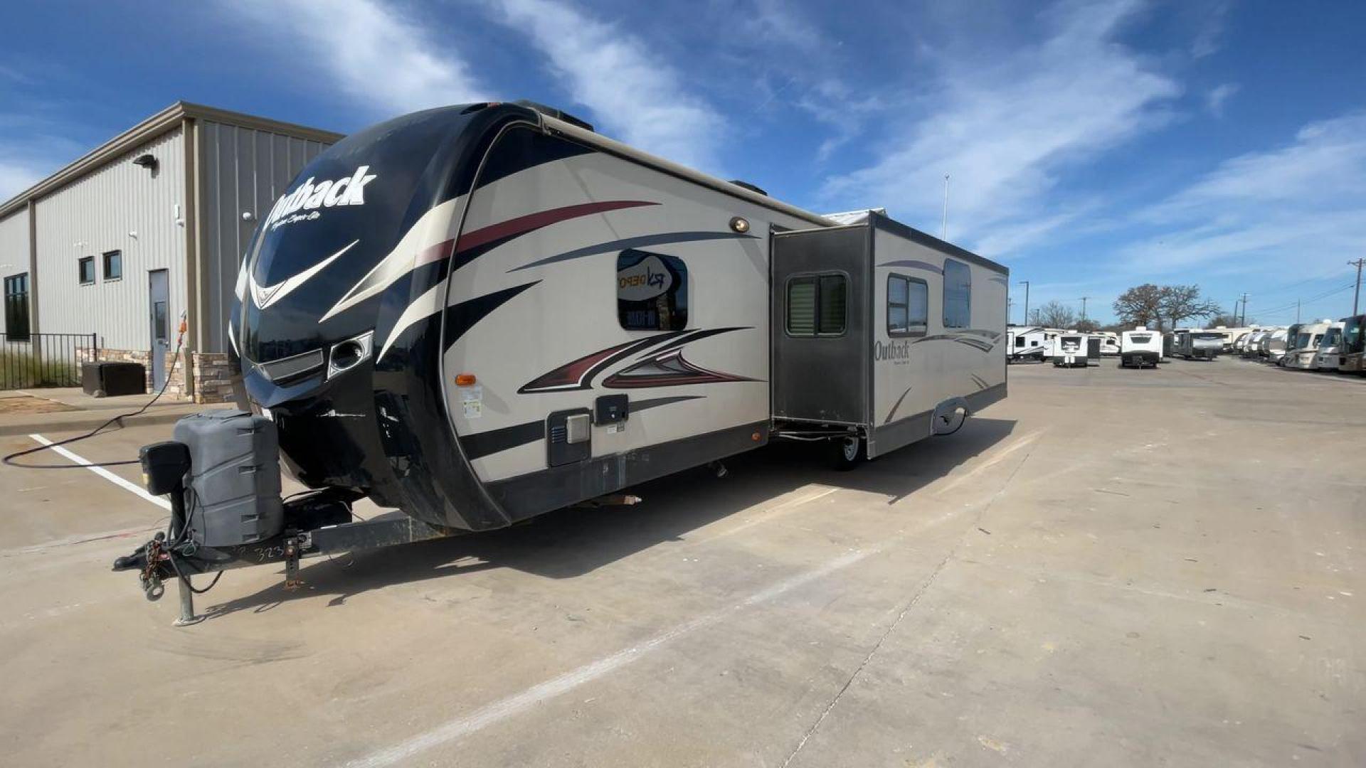 2015 TAN KEYSTONE OUTBACK 323BH (4YDT32321FB) , Length: 36 ft. | Dry Weight: 8,190 lbs. | Gross Weight: 9,500 lbs. | Slides: 2 transmission, located at 4319 N Main St, Cleburne, TX, 76033, (817) 678-5133, 32.385960, -97.391212 - Photo#5