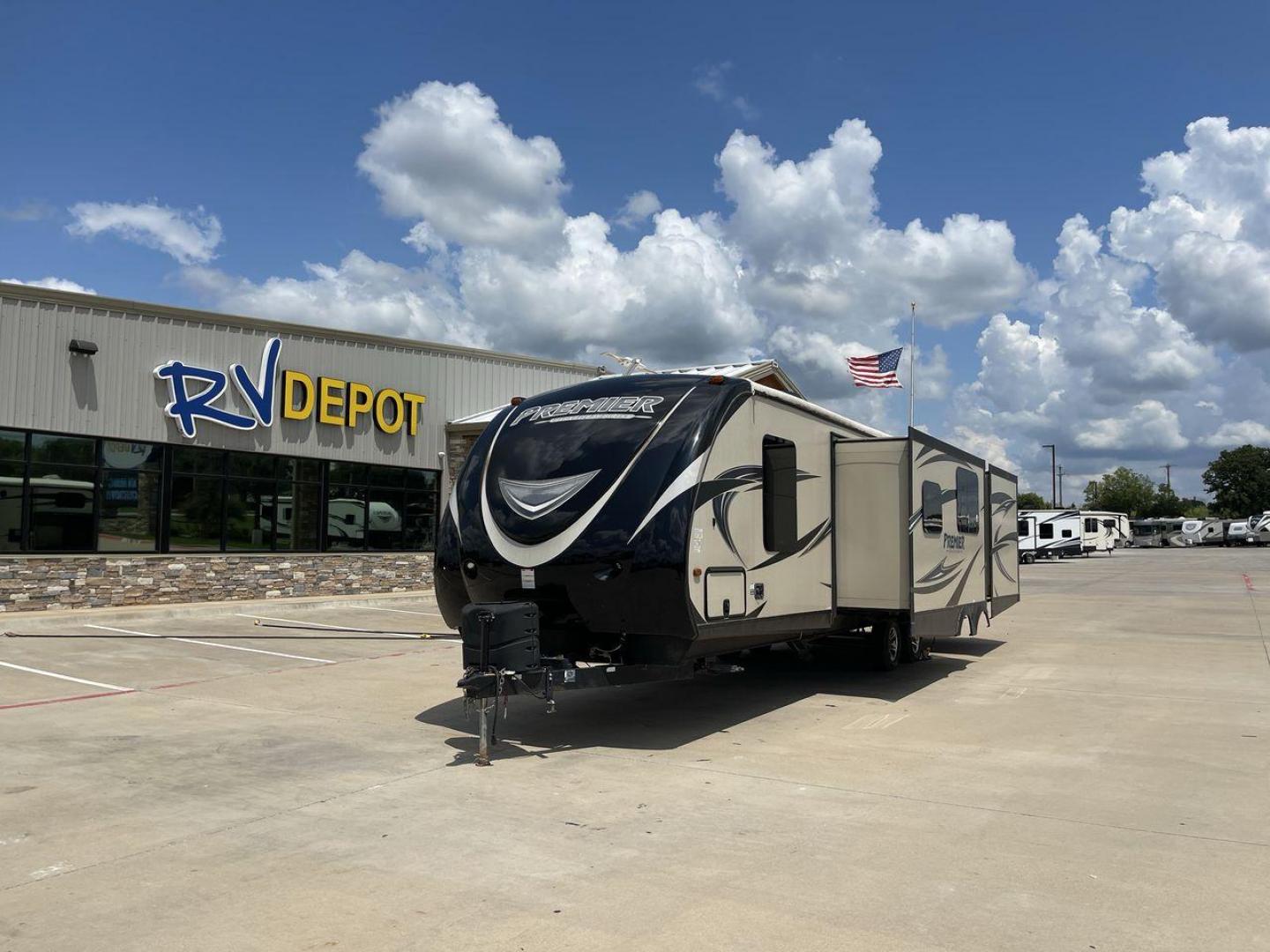 2015 TAN KEYSTONE PREMIER 34BHPR (4YDT34B25FD) , Length: 37 ft. | Dry Weight: 7,076 lbs. | Gross Weight: 8,800 lbs. | Slides: 3 transmission, located at 4319 N Main St, Cleburne, TX, 76033, (817) 678-5133, 32.385960, -97.391212 - Take a trip with more family members and friends in this remarkably spacious 2015 Keystone Premier 34BHPR! This travel trailer measures exactly 37 ft. in length and 10.92 ft. in height. It has a dry weight of 7,076 lbs. and a GVWR of 8,800 lbs. It highlights a rear bunk and an outside kitchen, ma - Photo#0