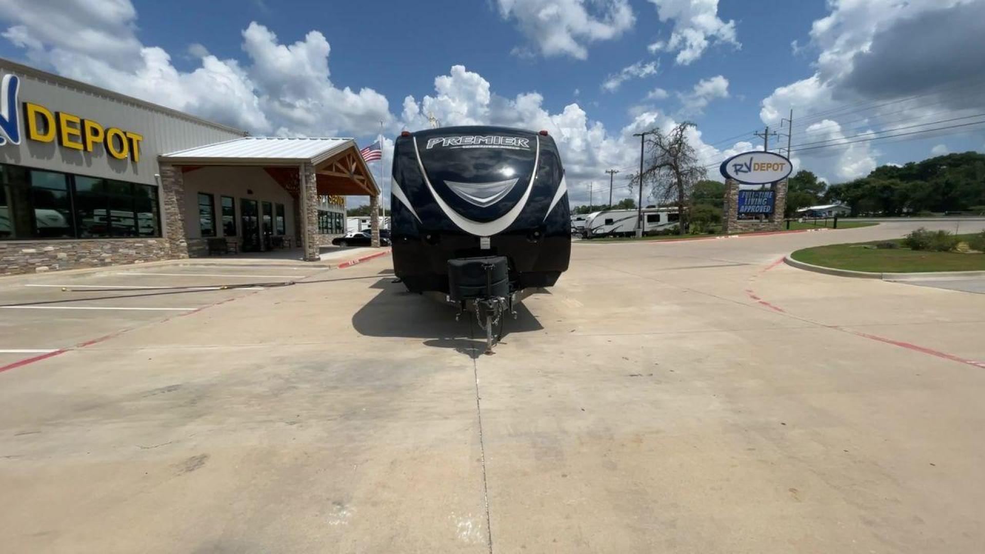 2015 TAN KEYSTONE PREMIER 34BHPR (4YDT34B25FD) , Length: 37 ft. | Dry Weight: 7,076 lbs. | Gross Weight: 8,800 lbs. | Slides: 3 transmission, located at 4319 N Main St, Cleburne, TX, 76033, (817) 678-5133, 32.385960, -97.391212 - Take a trip with more family members and friends in this remarkably spacious 2015 Keystone Premier 34BHPR! This travel trailer measures exactly 37 ft. in length and 10.92 ft. in height. It has a dry weight of 7,076 lbs. and a GVWR of 8,800 lbs. It highlights a rear bunk and an outside kitchen, ma - Photo#4