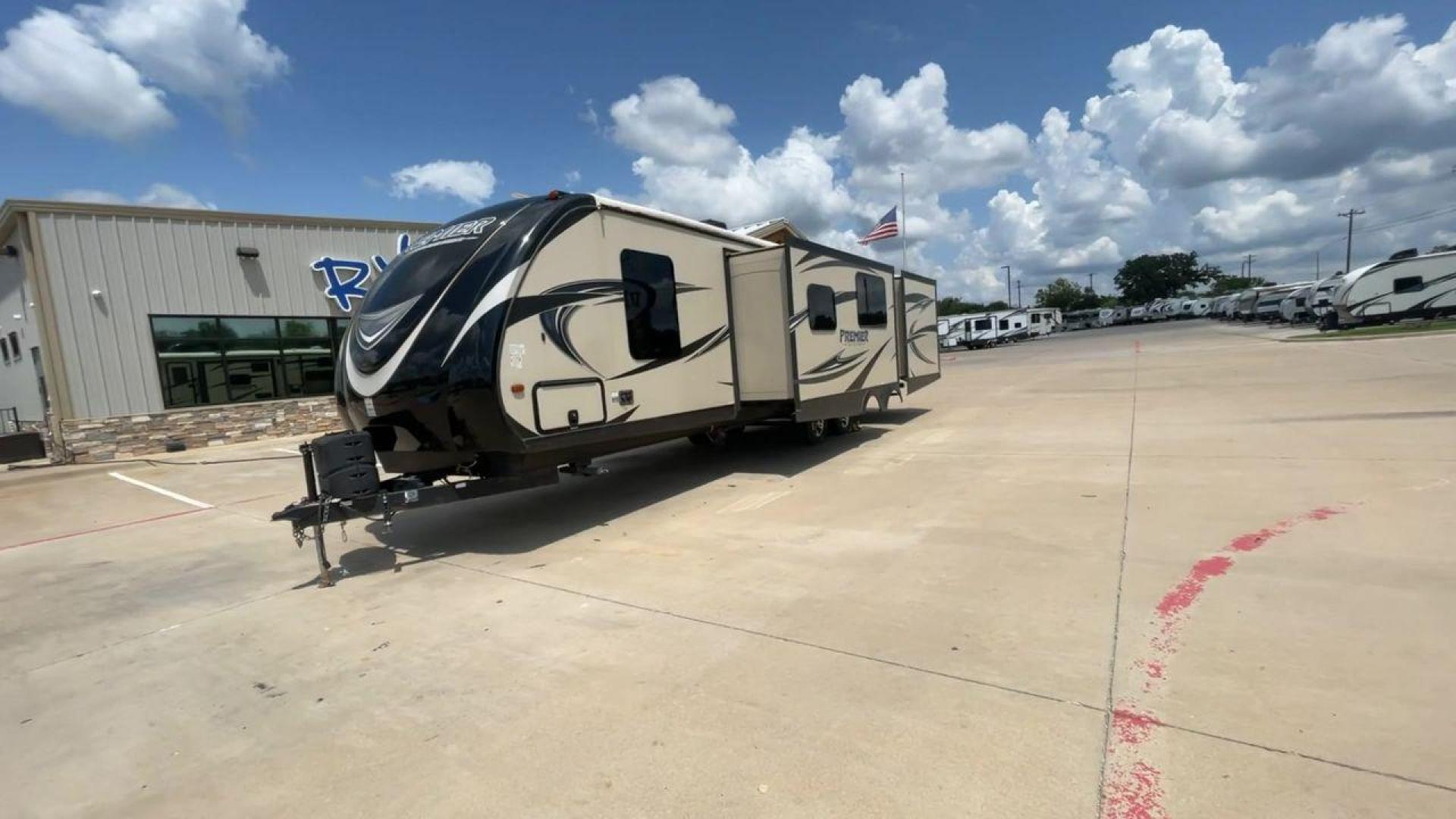 2015 TAN KEYSTONE PREMIER 34BHPR (4YDT34B25FD) , Length: 37 ft. | Dry Weight: 7,076 lbs. | Gross Weight: 8,800 lbs. | Slides: 3 transmission, located at 4319 N Main St, Cleburne, TX, 76033, (817) 678-5133, 32.385960, -97.391212 - Take a trip with more family members and friends in this remarkably spacious 2015 Keystone Premier 34BHPR! This travel trailer measures exactly 37 ft. in length and 10.92 ft. in height. It has a dry weight of 7,076 lbs. and a GVWR of 8,800 lbs. It highlights a rear bunk and an outside kitchen, ma - Photo#5