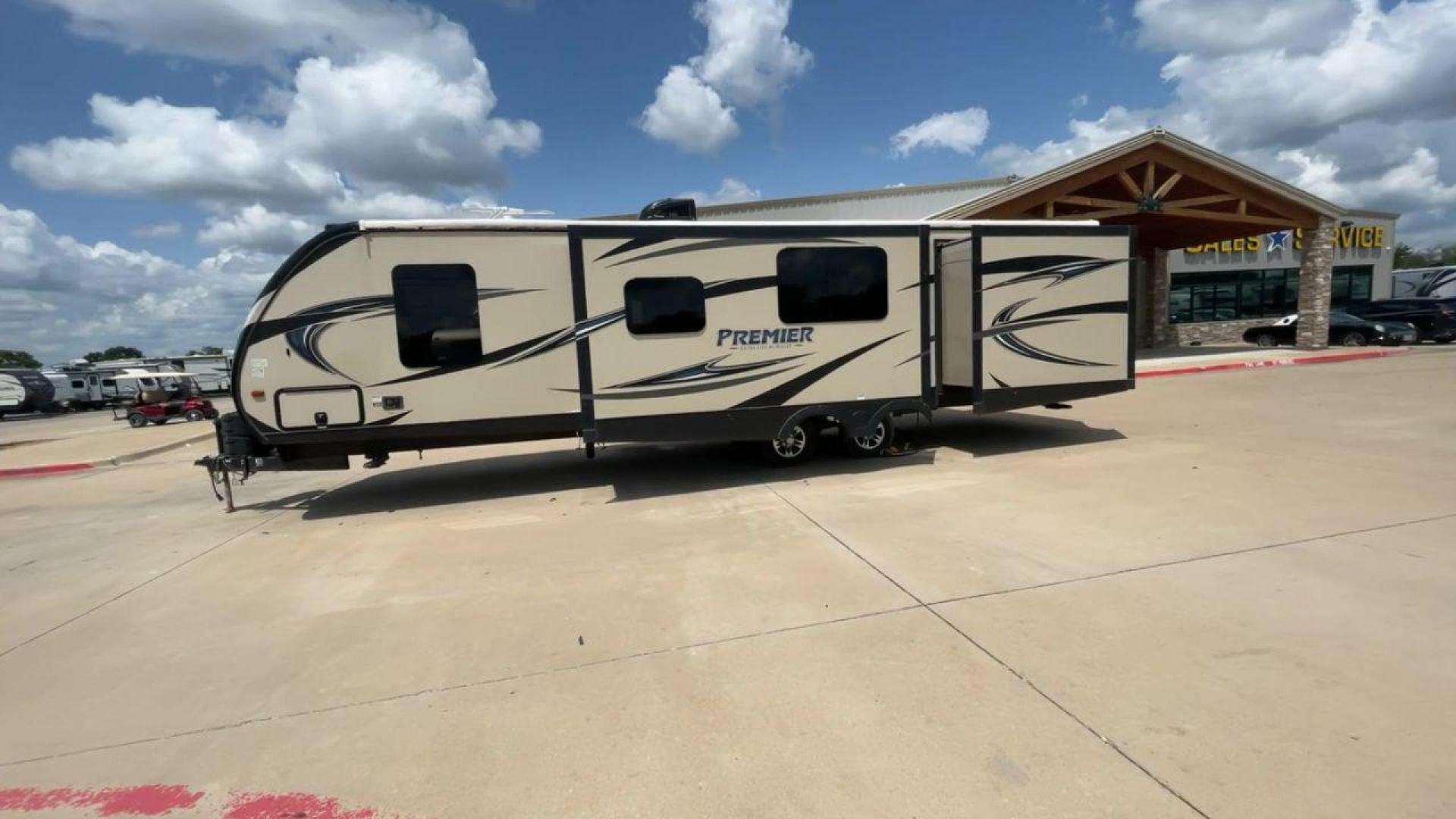 2015 TAN KEYSTONE PREMIER 34BHPR (4YDT34B25FD) , Length: 37 ft. | Dry Weight: 7,076 lbs. | Gross Weight: 8,800 lbs. | Slides: 3 transmission, located at 4319 N Main St, Cleburne, TX, 76033, (817) 678-5133, 32.385960, -97.391212 - Take a trip with more family members and friends in this remarkably spacious 2015 Keystone Premier 34BHPR! This travel trailer measures exactly 37 ft. in length and 10.92 ft. in height. It has a dry weight of 7,076 lbs. and a GVWR of 8,800 lbs. It highlights a rear bunk and an outside kitchen, ma - Photo#6