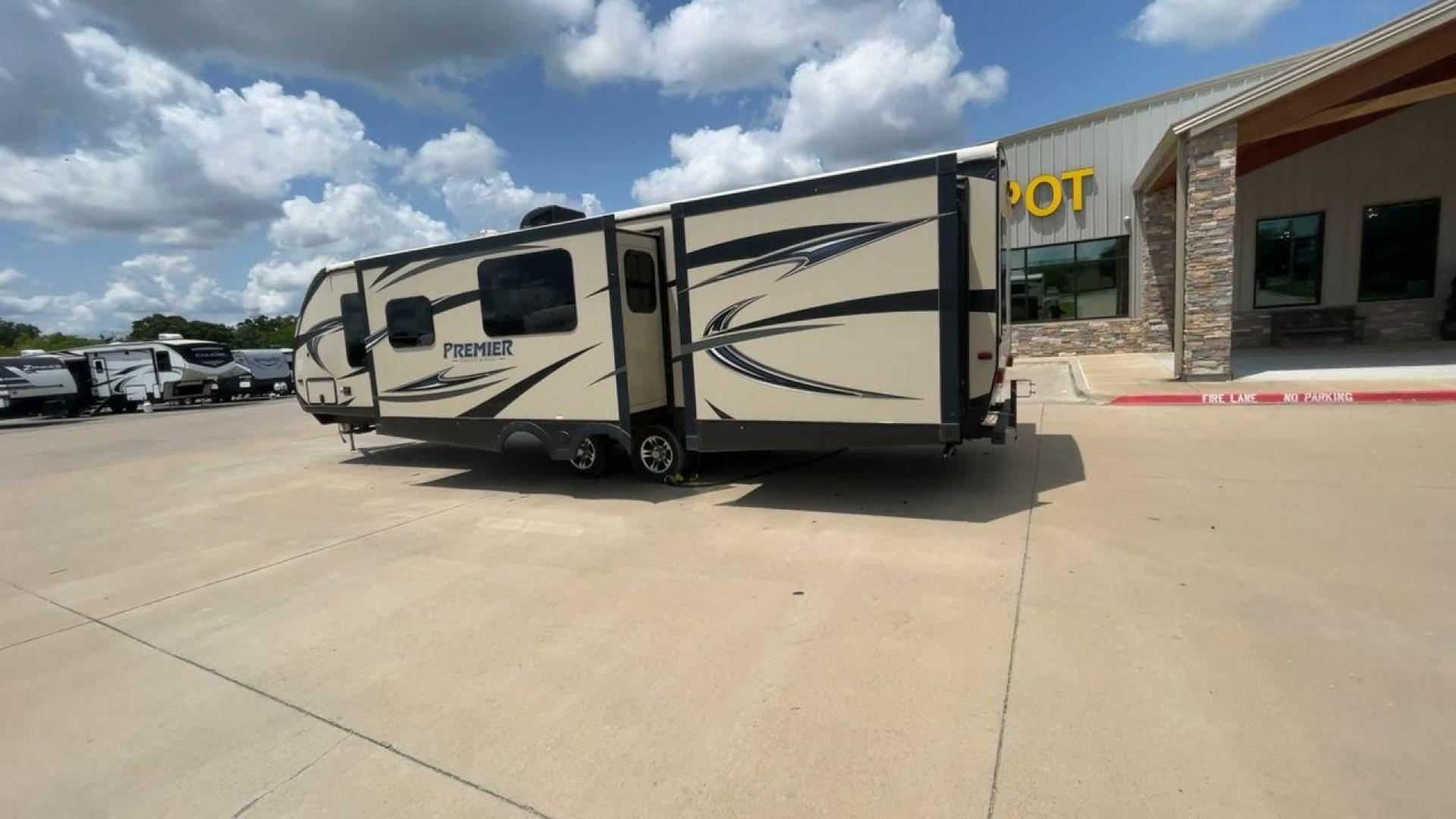 2015 TAN KEYSTONE PREMIER 34BHPR (4YDT34B25FD) , Length: 37 ft. | Dry Weight: 7,076 lbs. | Gross Weight: 8,800 lbs. | Slides: 3 transmission, located at 4319 N Main St, Cleburne, TX, 76033, (817) 678-5133, 32.385960, -97.391212 - Take a trip with more family members and friends in this remarkably spacious 2015 Keystone Premier 34BHPR! This travel trailer measures exactly 37 ft. in length and 10.92 ft. in height. It has a dry weight of 7,076 lbs. and a GVWR of 8,800 lbs. It highlights a rear bunk and an outside kitchen, ma - Photo#7