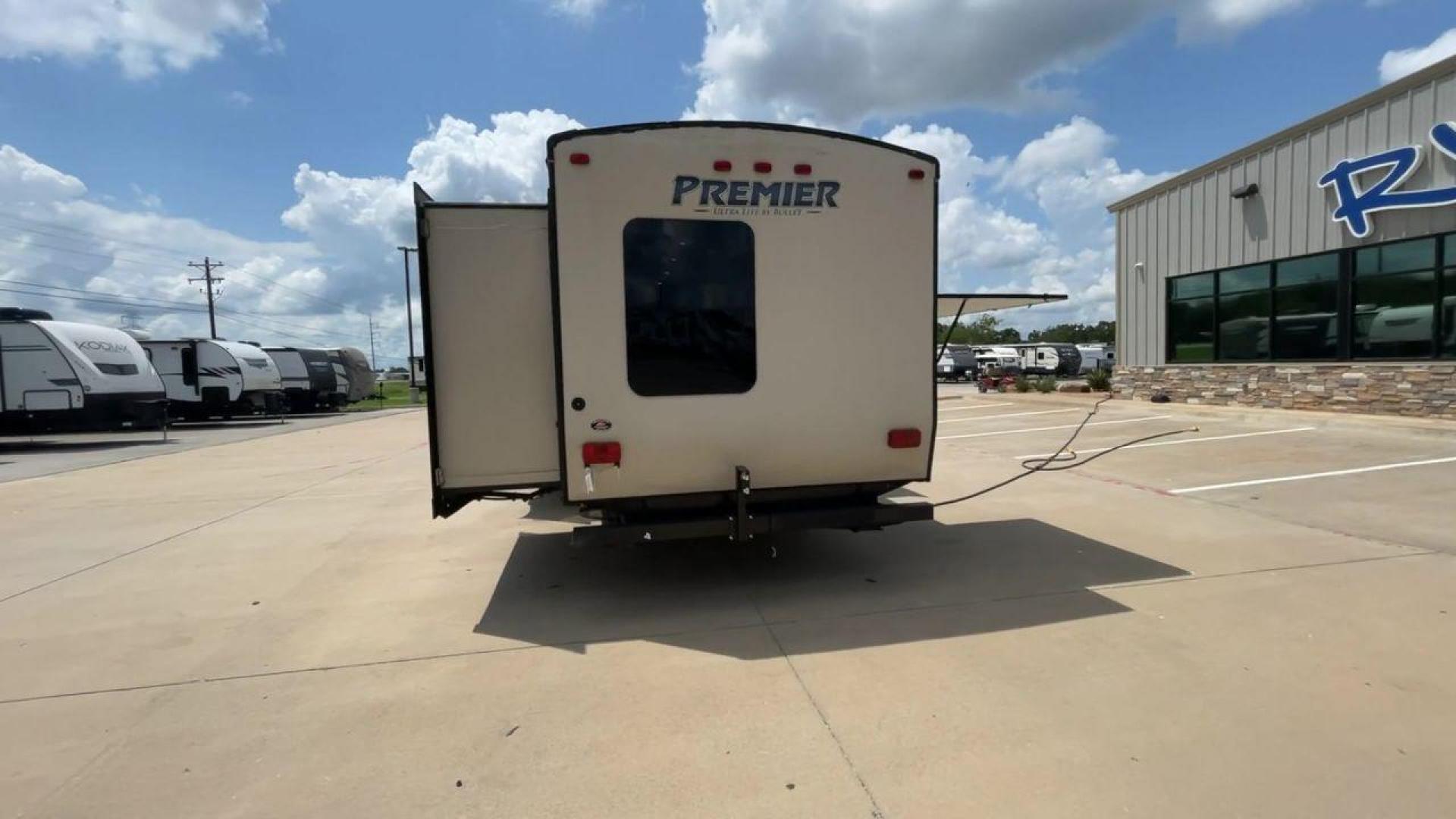 2015 TAN KEYSTONE PREMIER 34BHPR (4YDT34B25FD) , Length: 37 ft. | Dry Weight: 7,076 lbs. | Gross Weight: 8,800 lbs. | Slides: 3 transmission, located at 4319 N Main St, Cleburne, TX, 76033, (817) 678-5133, 32.385960, -97.391212 - Take a trip with more family members and friends in this remarkably spacious 2015 Keystone Premier 34BHPR! This travel trailer measures exactly 37 ft. in length and 10.92 ft. in height. It has a dry weight of 7,076 lbs. and a GVWR of 8,800 lbs. It highlights a rear bunk and an outside kitchen, ma - Photo#8