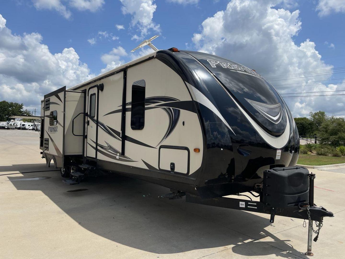 2015 TAN KEYSTONE PREMIER 34BHPR (4YDT34B25FD) , Length: 37 ft. | Dry Weight: 7,076 lbs. | Gross Weight: 8,800 lbs. | Slides: 3 transmission, located at 4319 N Main St, Cleburne, TX, 76033, (817) 678-5133, 32.385960, -97.391212 - Take a trip with more family members and friends in this remarkably spacious 2015 Keystone Premier 34BHPR! This travel trailer measures exactly 37 ft. in length and 10.92 ft. in height. It has a dry weight of 7,076 lbs. and a GVWR of 8,800 lbs. It highlights a rear bunk and an outside kitchen, ma - Photo#23