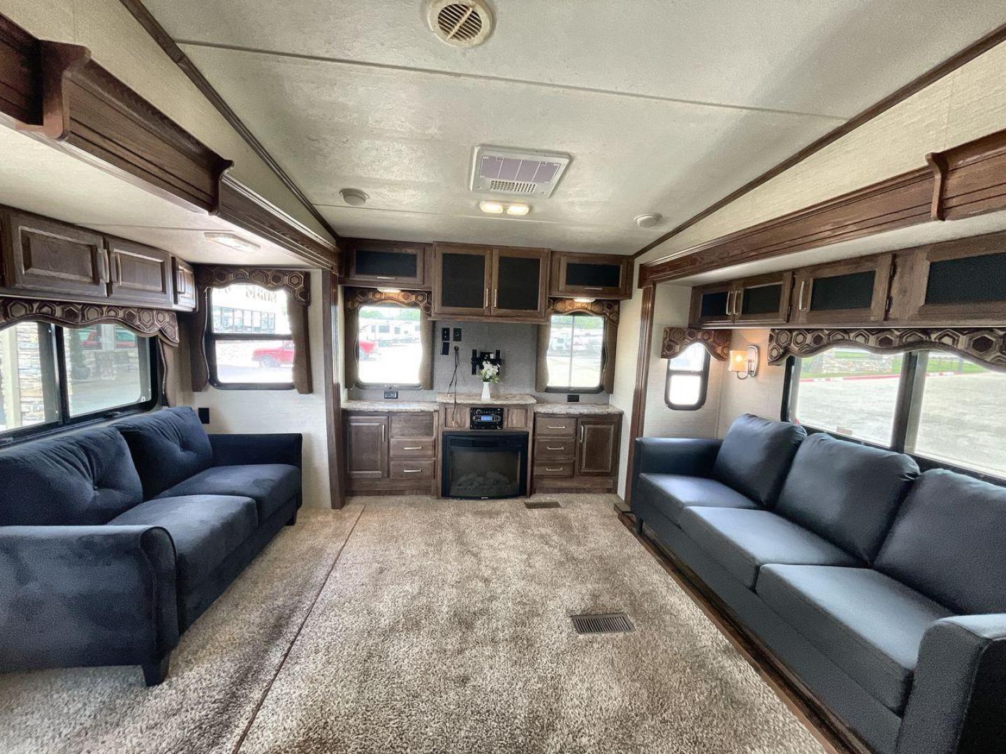 2015 KEYSTONE RV COUGAR 327RES (4YDF32729F2) , Length: 36.42 ft. | Dry Weight: 10,213 lbs. | Gross Weight: 12,135 lbs. | Slides: 3 transmission, located at 4319 N Main St, Cleburne, TX, 76033, (817) 678-5133, 32.385960, -97.391212 - Enjoy the abundant storage and space that comes with the 2015 Keystone Cougar 327RES! This fifth wheel measures 36.42 ft. in length and 12.25 ft. in height. It has a dry weight of 10,213 lbs. and a GVWR of 12,135 lbs. It also comes equipped with automatic heating and cooling rated at 30,000 and 1 - Photo#10