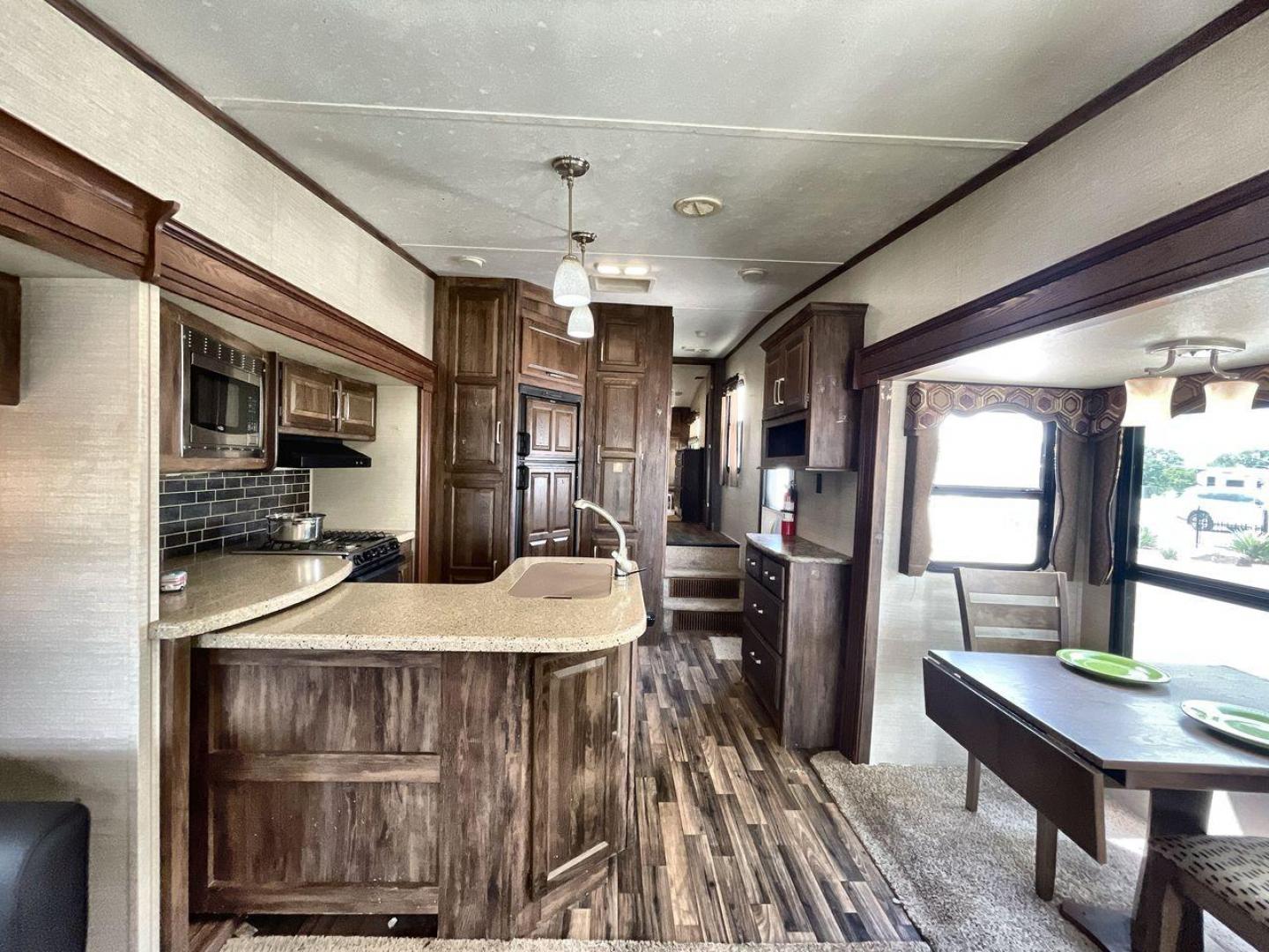 2015 KEYSTONE RV COUGAR 327RES (4YDF32729F2) , Length: 36.42 ft. | Dry Weight: 10,213 lbs. | Gross Weight: 12,135 lbs. | Slides: 3 transmission, located at 4319 N Main St, Cleburne, TX, 76033, (817) 678-5133, 32.385960, -97.391212 - Enjoy the abundant storage and space that comes with the 2015 Keystone Cougar 327RES! This fifth wheel measures 36.42 ft. in length and 12.25 ft. in height. It has a dry weight of 10,213 lbs. and a GVWR of 12,135 lbs. It also comes equipped with automatic heating and cooling rated at 30,000 and 1 - Photo#12