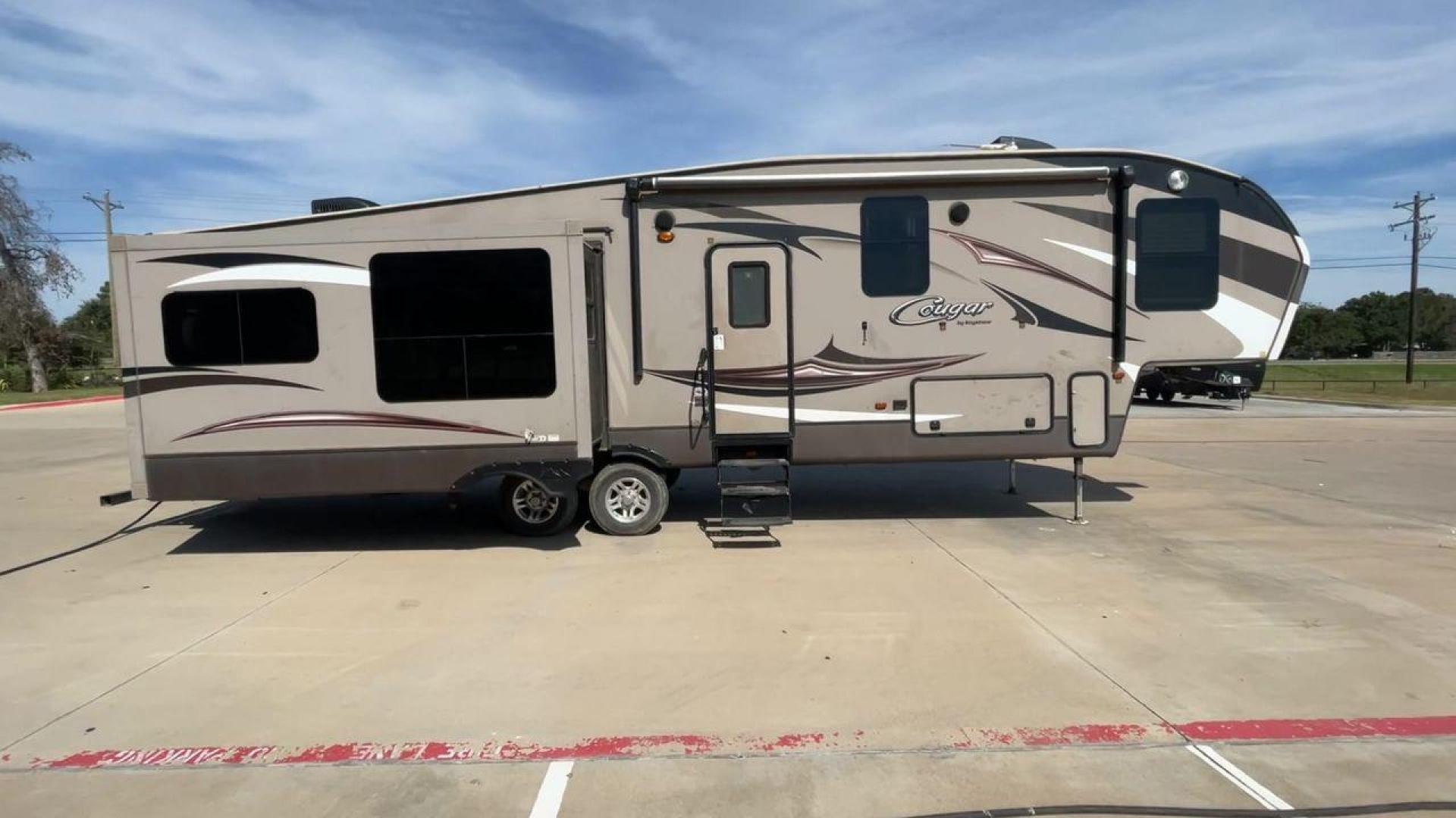 2015 KEYSTONE RV COUGAR 327RES (4YDF32729F2) , Length: 36.42 ft. | Dry Weight: 10,213 lbs. | Gross Weight: 12,135 lbs. | Slides: 3 transmission, located at 4319 N Main St, Cleburne, TX, 76033, (817) 678-5133, 32.385960, -97.391212 - Enjoy the abundant storage and space that comes with the 2015 Keystone Cougar 327RES! This fifth wheel measures 36.42 ft. in length and 12.25 ft. in height. It has a dry weight of 10,213 lbs. and a GVWR of 12,135 lbs. It also comes equipped with automatic heating and cooling rated at 30,000 and 1 - Photo#2