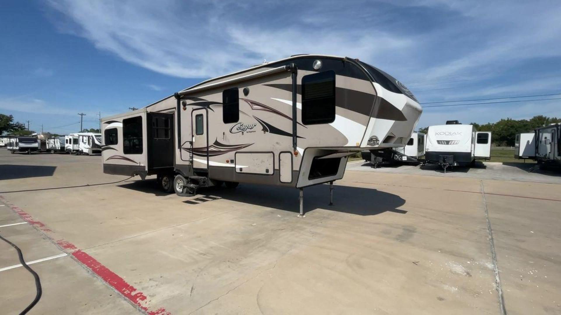 2015 KEYSTONE RV COUGAR 327RES (4YDF32729F2) , Length: 36.42 ft. | Dry Weight: 10,213 lbs. | Gross Weight: 12,135 lbs. | Slides: 3 transmission, located at 4319 N Main St, Cleburne, TX, 76033, (817) 678-5133, 32.385960, -97.391212 - Enjoy the abundant storage and space that comes with the 2015 Keystone Cougar 327RES! This fifth wheel measures 36.42 ft. in length and 12.25 ft. in height. It has a dry weight of 10,213 lbs. and a GVWR of 12,135 lbs. It also comes equipped with automatic heating and cooling rated at 30,000 and 1 - Photo#3