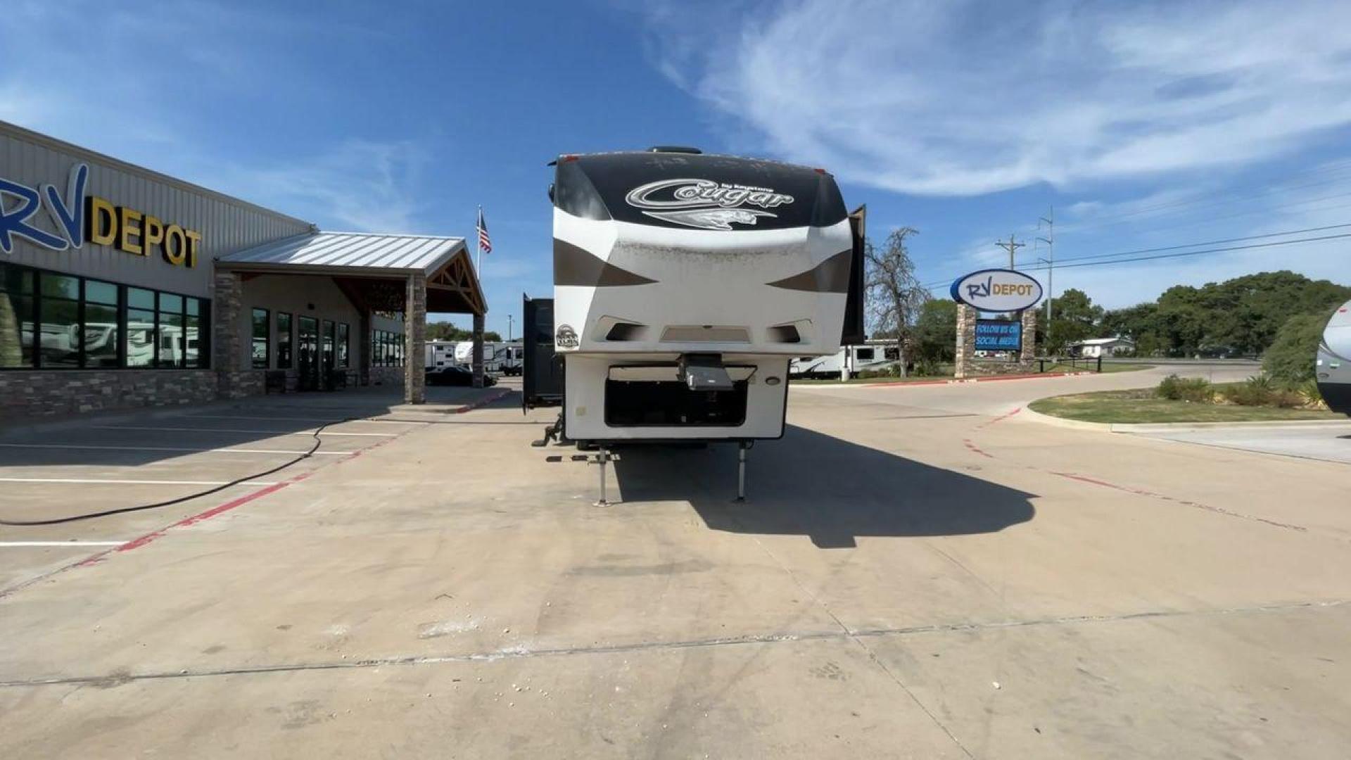 2015 KEYSTONE RV COUGAR 327RES (4YDF32729F2) , Length: 36.42 ft. | Dry Weight: 10,213 lbs. | Gross Weight: 12,135 lbs. | Slides: 3 transmission, located at 4319 N Main St, Cleburne, TX, 76033, (817) 678-5133, 32.385960, -97.391212 - Enjoy the abundant storage and space that comes with the 2015 Keystone Cougar 327RES! This fifth wheel measures 36.42 ft. in length and 12.25 ft. in height. It has a dry weight of 10,213 lbs. and a GVWR of 12,135 lbs. It also comes equipped with automatic heating and cooling rated at 30,000 and 1 - Photo#4