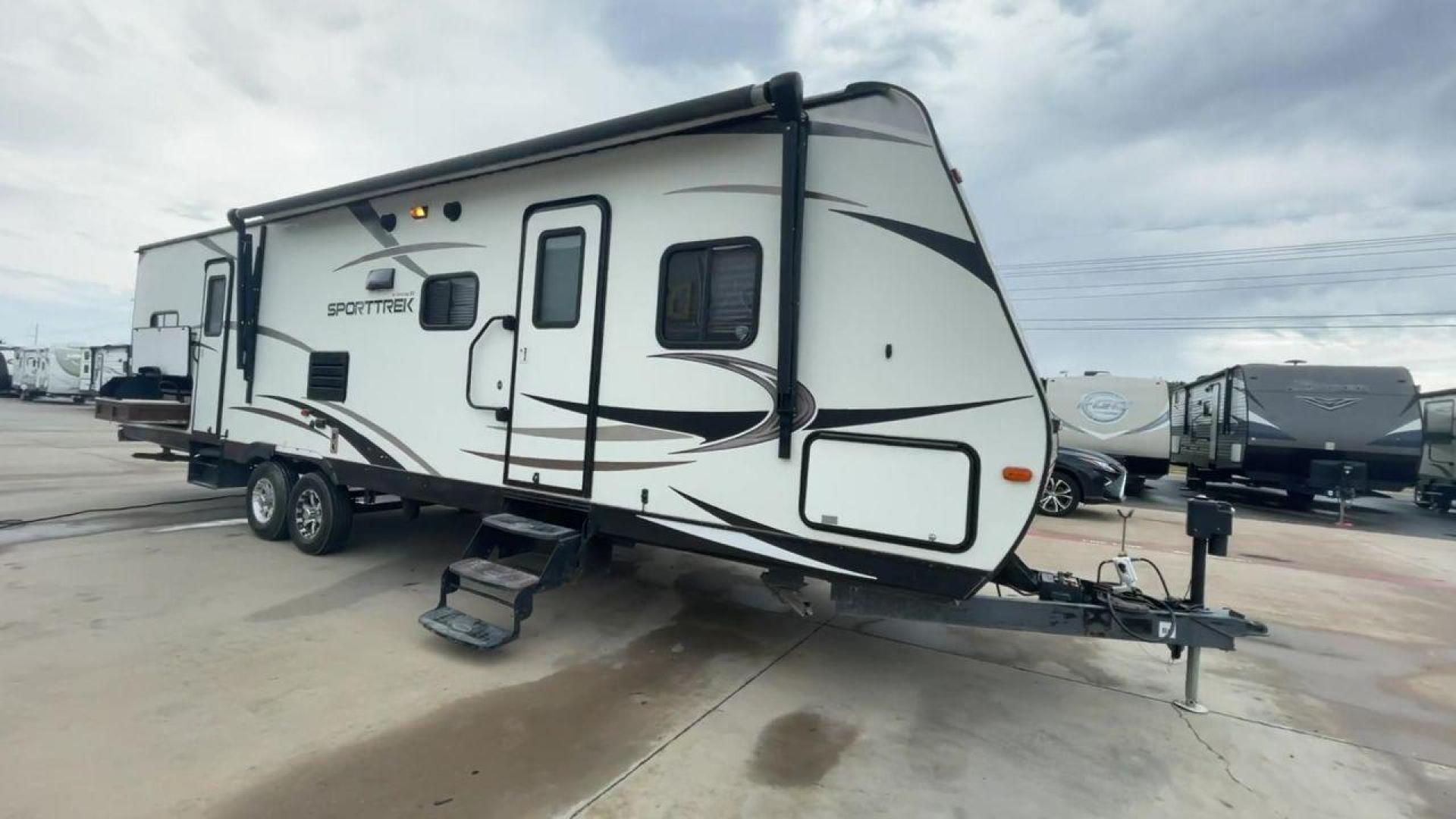 2015 WHITE KZ VENTURE RV SPORTTREK (4EZT13128F5) , Length: 35.6 ft | Dry Weight: 7,110 lbs | Gross Weight: 8,300 lbs | Slides: 2 transmission, located at 4319 N Main St, Cleburne, TX, 76033, (817) 678-5133, 32.385960, -97.391212 - With the 2015 KZ Venture RV SportTrek Travel Trailer, set out on your next adventure. With the modern traveler in mind, this travel trailer offers the ideal balance of comfort, style, and functionality. This unit measures 35.5 ft in length, 8 ft in width, and 10.92 ft in height. It has a dry weig - Photo#3